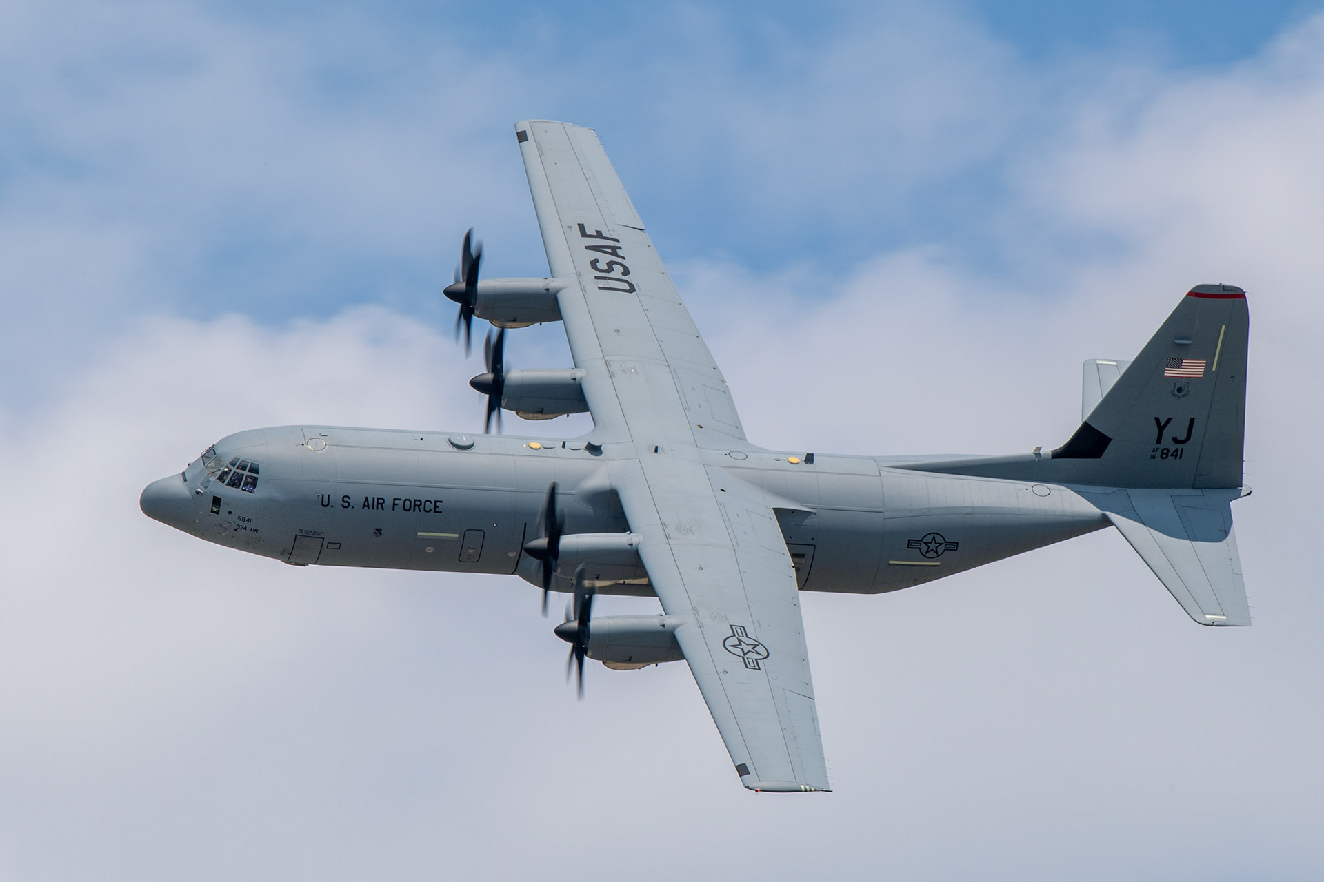 A C-130J Super Hercules assigned to the 374th Operations Group flies over Yokota Air Base, Japan during Col. Barry King’s, 374th Operations Group deputy commander, fini-flight, July 23, 2019. For many aircrew, the fini-flight is a way to recognize and honor fellow aviators for their dedication to the mission. (U.S. Air Force photo by Yasuo Osakabe)
