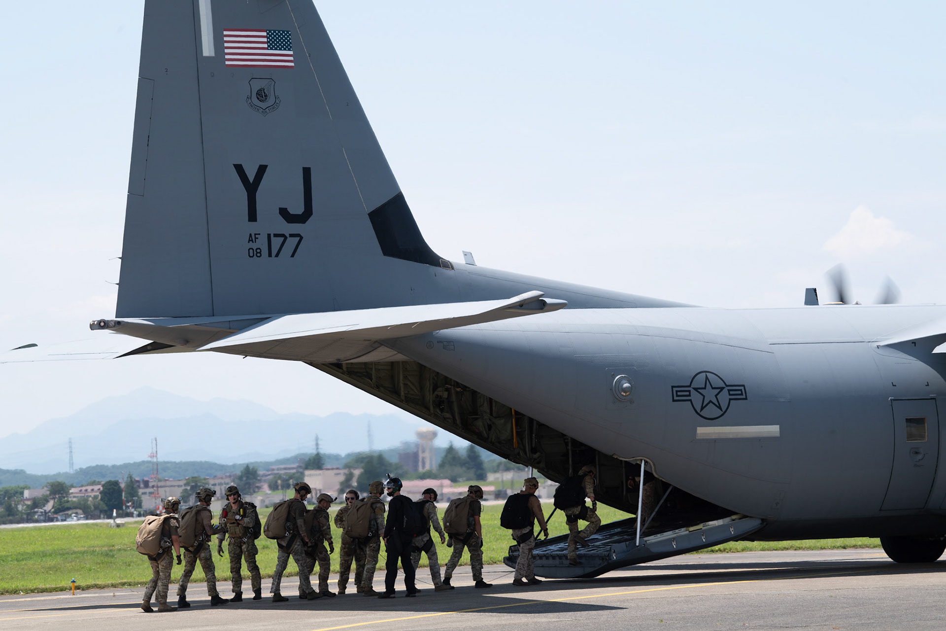 U.S. Special Operations Forces members board a C-130J Super Hercules assigned to the 36th Airlift Squadron during Exercise Gryphon Jet at Yokota Air Base, Japan, June 17, 2020. Gryphon Jet is an integrated training exercise focused on improving interoperability throughout the special operations community. (U.S. Air Force photo by Yasuo Osakabe)