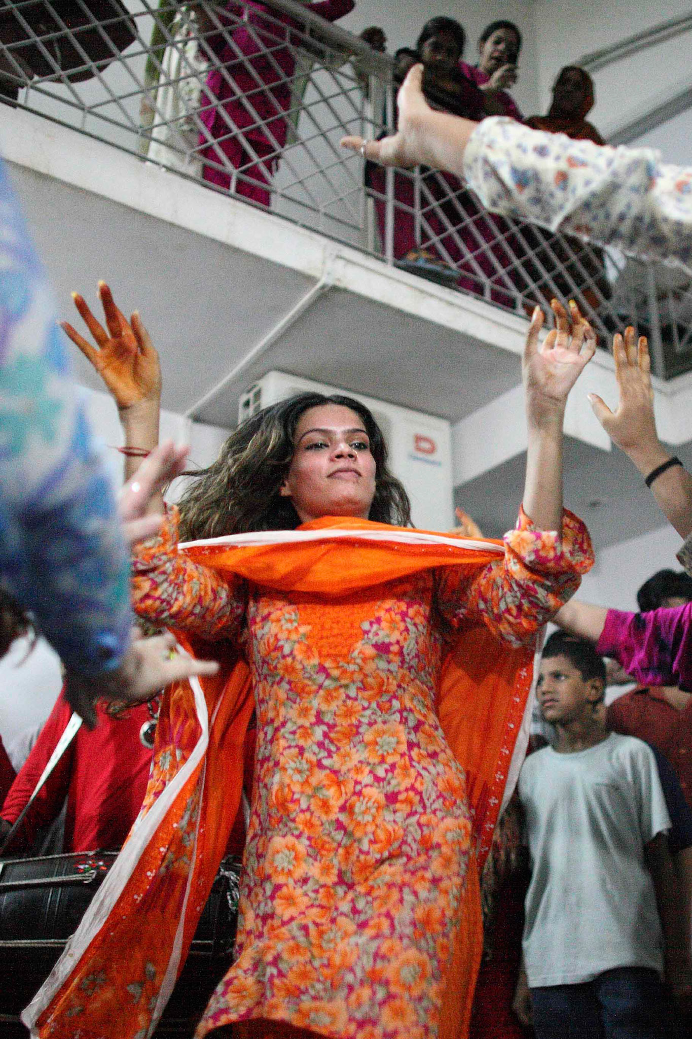 Ladies dancing to beating drums worked themselves into an euphoria. (Travel)