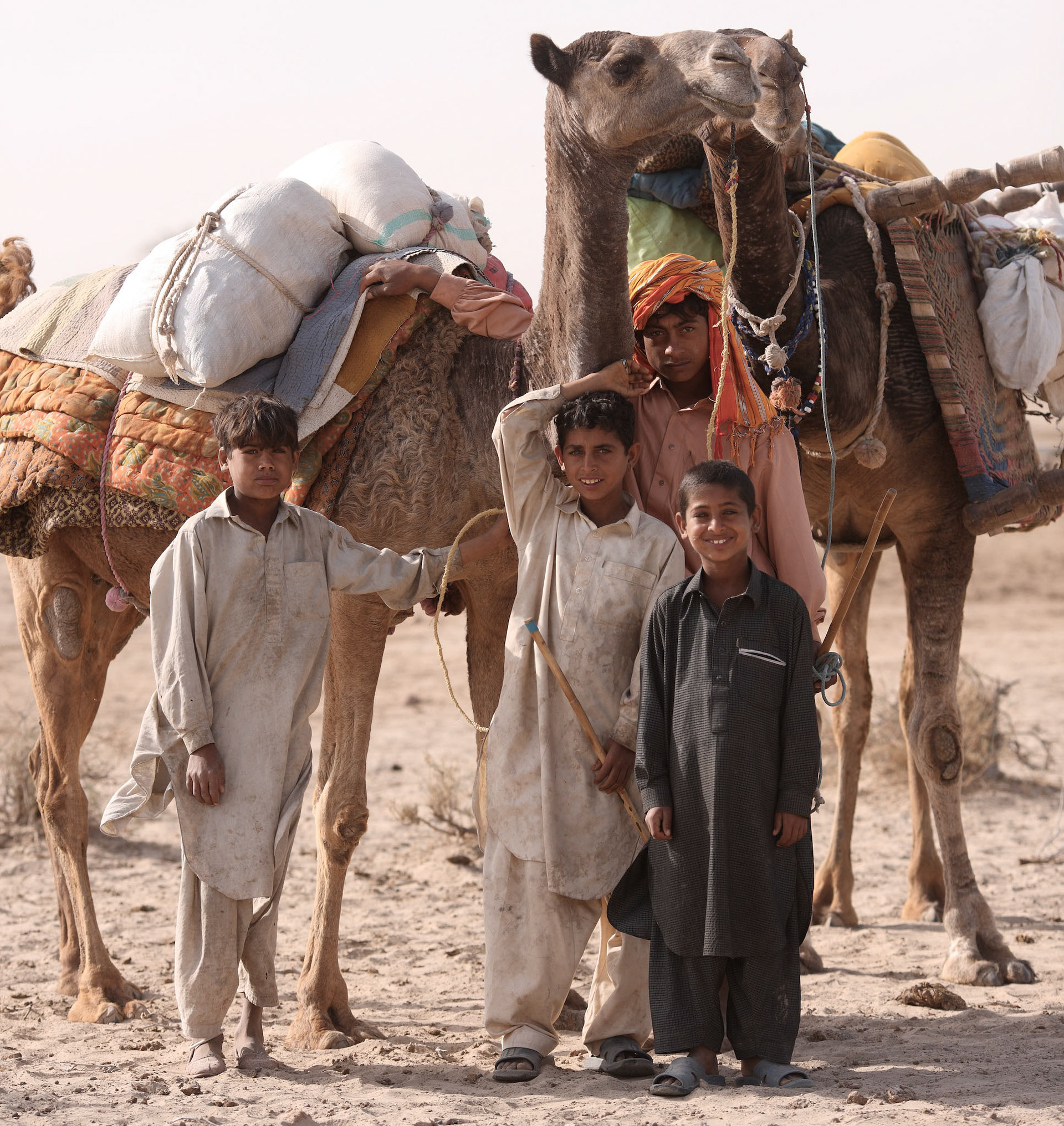 Children were going to move the next oasis with his camel on the furniture and household goods. (Travel)