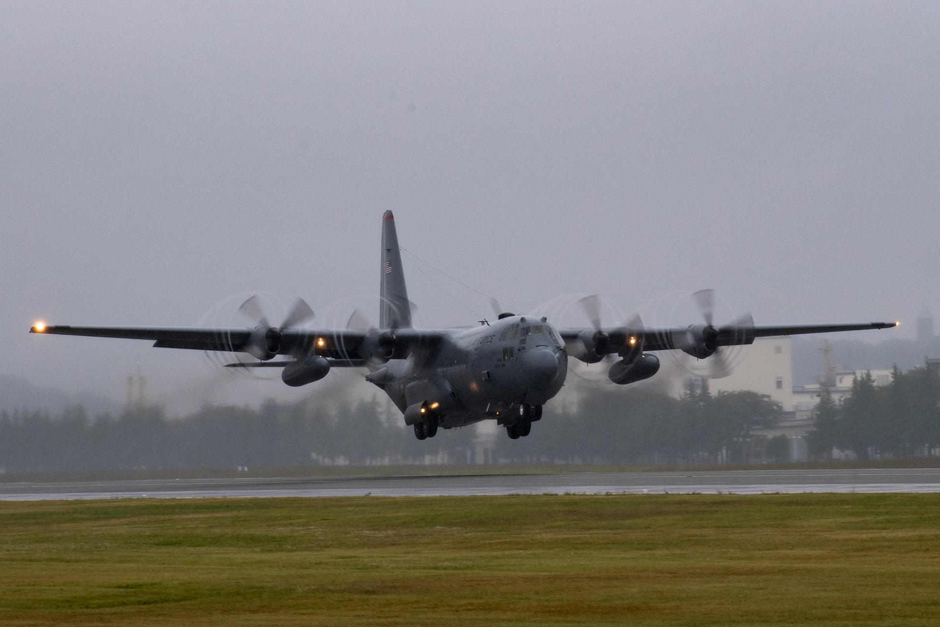 A C-130H Hercules assigned to the 36th Airlift Squadron leaves propeller tip vortices in tis wake as it takes off from Yokota Air Base, Japan, Oct. 16, 2017, during the C-130H farewell ceremony. After completing the ceremony, Yokota sent off its last two C-130Hs. (U.S. Air Force photo by Yasuo Osakabe)