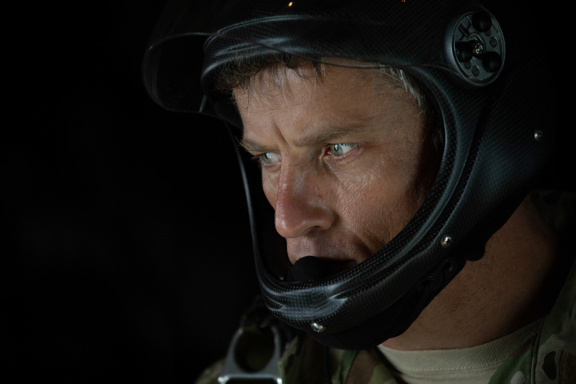 U.S. Air Force Tech Sgt. Seth Sarrett, 374th Operations Support Squadron Survival, Evasion, Resistance and Escape specialist, performs a visual confirmation over Hiju-dai exercise area, Oita prefecture, Japan, July 16, 2019, during a bilateral jump training. The training allows USAF and JGSDF units to work alongside each other while improving the readiness of our armed forces. (U.S. Air Force photo by Yasuo Osakabe)
