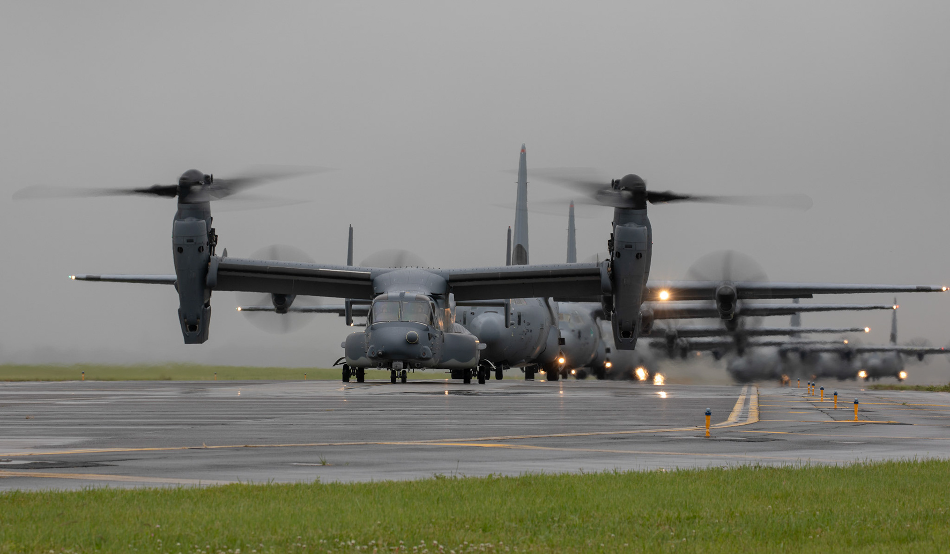 A CV-22 Osprey assigned to the 353rd Special Operations Group Detachment 1 taxi on the runway at Yokota Air Base, Japan, May 21, 2020, during the Samura Surge training exercise. With 17 aircraft participating, the Samurai Surge allowed the 374th Airlift Wing to test its mission capability through an elephant walk, training flight, and low-cost, low-altitude airdrop exercises, providing aircrews the vital training needed to respond in area of responsibility as unique as the Indo-Pacific. (U.S. Air Force photo by Yasuo Osakabe)