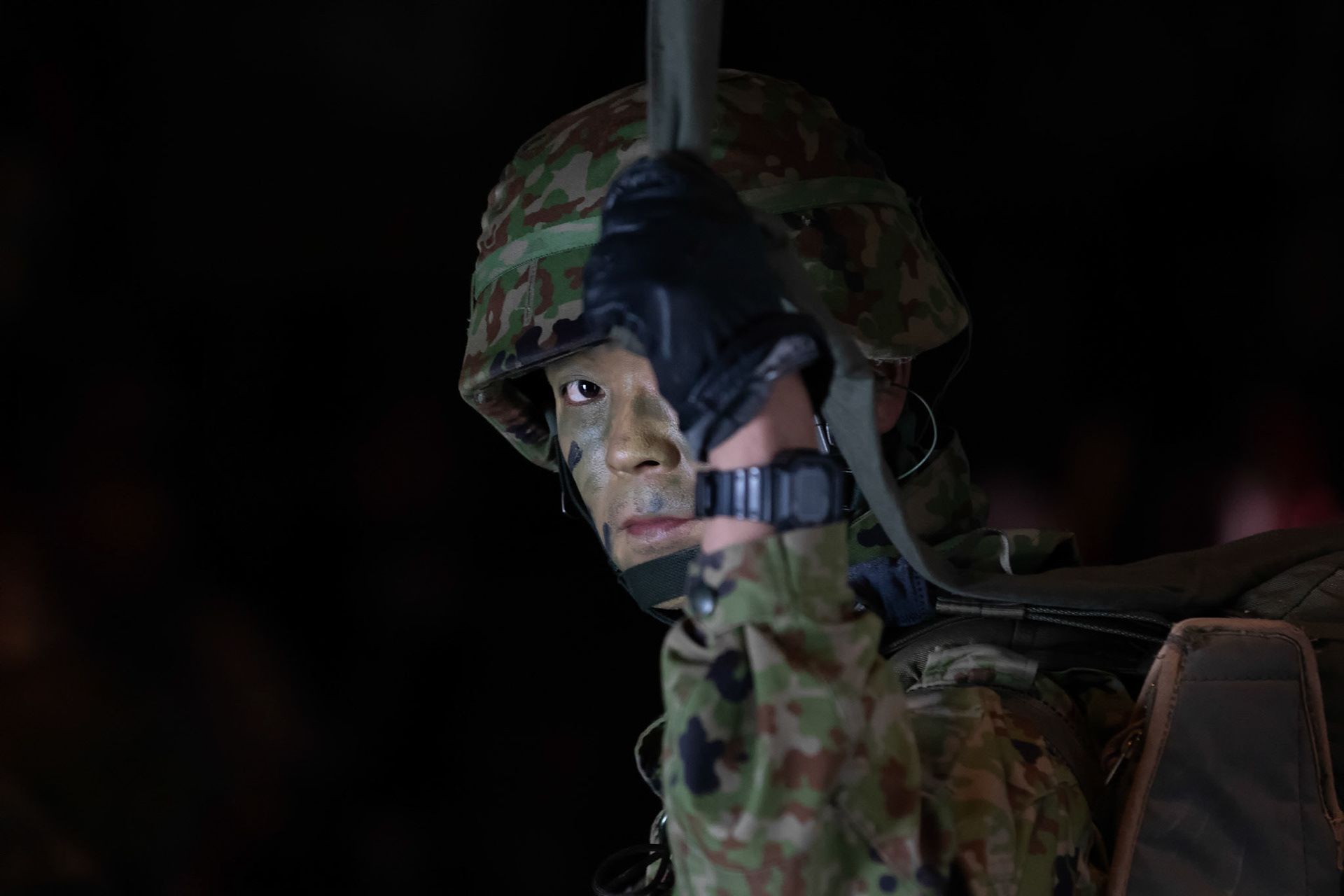 A Japan Ground Self-Defense Force soldier assigned to the 1st Airborne Brigade waits to jump from a U.S. Air Force C-130J Super Hercules over Hiju-dai drop zone, Oita prefecture, Japan, Nov. 4, 2018, during Keen Sword 19. Approximately 280 JGSDF personnel conducted jump training from U.S. Air Force C-130J Super Hercules’ for the first time in Japan. (U.S. Air Force photo by Yasuo Osakabe)