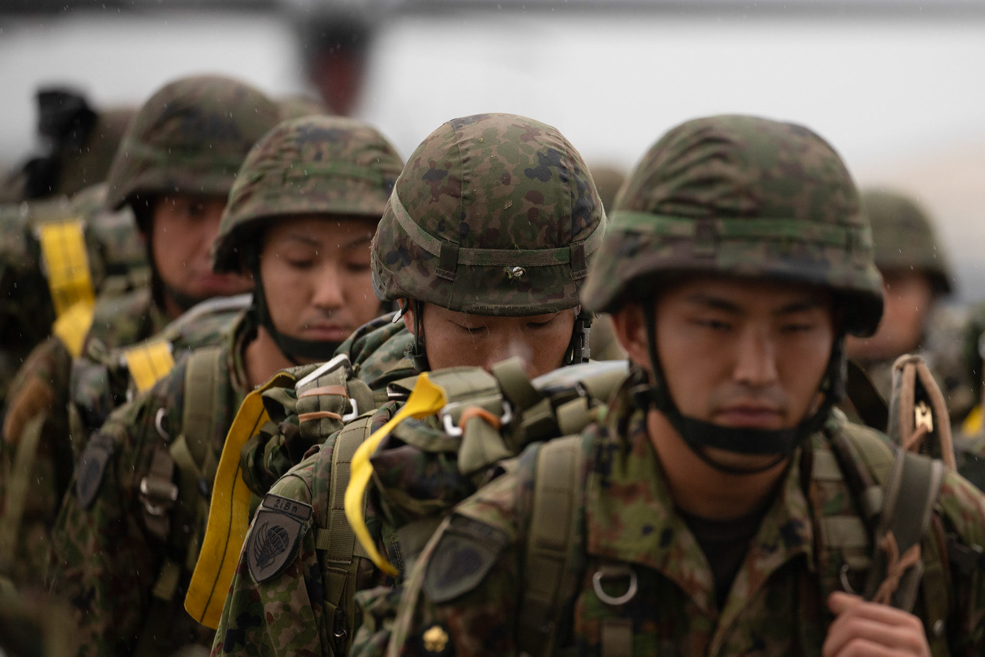 Japan Ground Self-Defense Force soldiers with the 1st Airborne Brigade board a U.S. Air Force C-130J Super Hercules assigned to the 36th Airlift Squadron at Yokota Air Base, Japan, July 16, 2019, during a bilateral jump training. The training allows USAF and JGSDF units to work alongside each other while improving the readiness of our armed forces. (U.S. Air Force photo by Yasuo Osakabe)