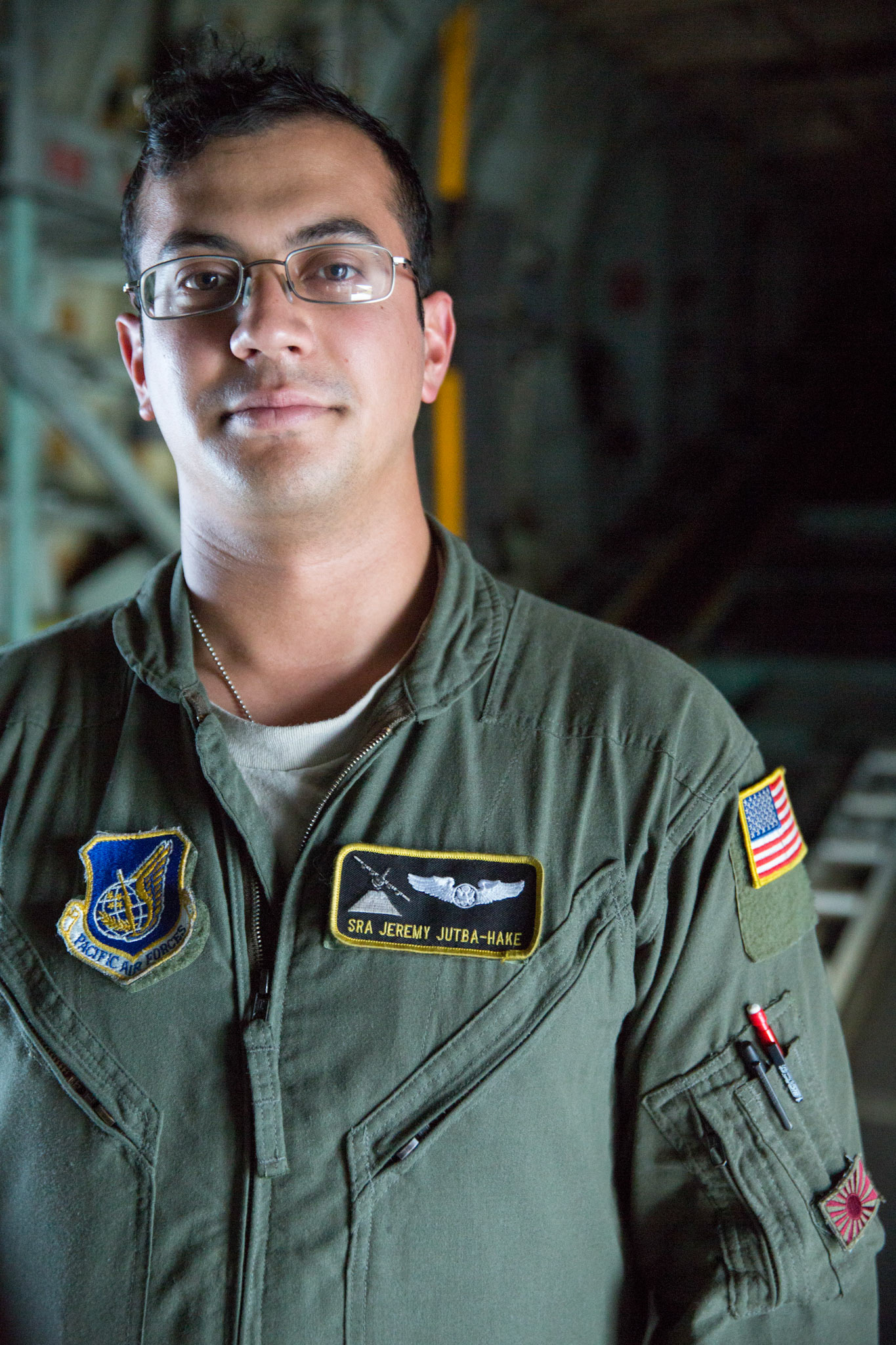 Senior Airman Jeremy Jutba-Hake, 36th Airlift Squadron loadmaster, poses for a photo after landing at Andersen Air Force Base, Guam, Dec. 11, 2015, during Operation Christmas Drop. SrA Jutba passed away following a mission during OCD 2015. (U.S. Air Force photo by Yasuo Osakabe)