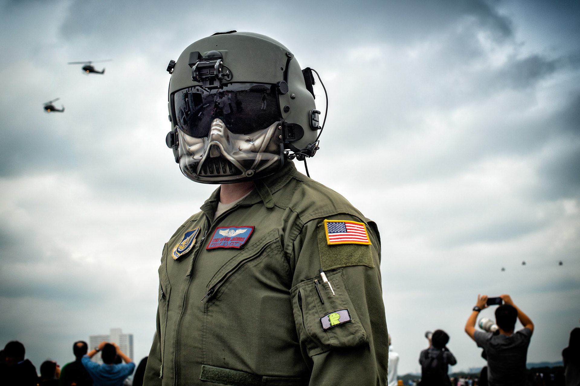 U.S. Air Force Tech. Sgt. David Jacob, 459th Airlift Squadron special mission aviator, participates in the the 43rd Anniversary Event of Japan Ground Self-Defense Force Camp Tachikawa at JGSDF Camp Tachikawa, Japan, Oct. 1, 2016. JGSDF UH-1Js assigned to Eastern Army Helicopter demonstrated flight formations, hoist techniques and disaster relief procedures with first responders. Service members with the 459th Airlift Squadron from Yokota Air Base and Army Aviation Battalion from Camp Zama participated in the festival. (U.S. Air Force photo by Yasuo Osakabe/Released)