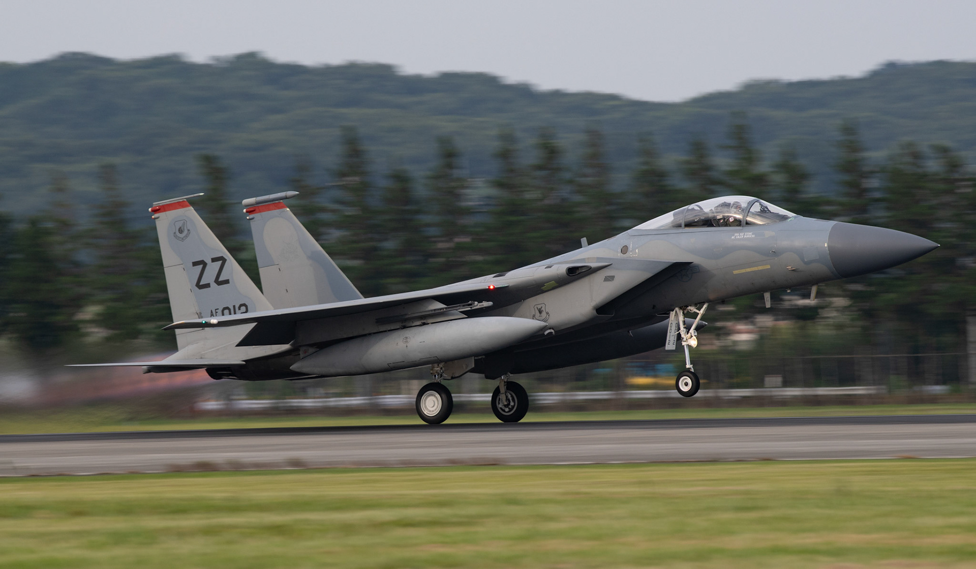 A U.S. Air Force F-15 Eagle assigned to the 67th Fighter Squadron, Kadena Air Base, Japan, takes off at Yokota Air Base, Japan, July 11, 2018, after Tropical Cyclone Conditions of Readiness (TCCOR) is declared All Clear at Kadena. Eighteen F-15 Eagle fighters evacuated to Yokota due to Typhoon Maria. The F-15 Eagle is a purpose-built air superiority fighter capable of detecting, acquiring and tracking enemy aircraft.(U.S. Air Force photo by Yasuo Osakabe)