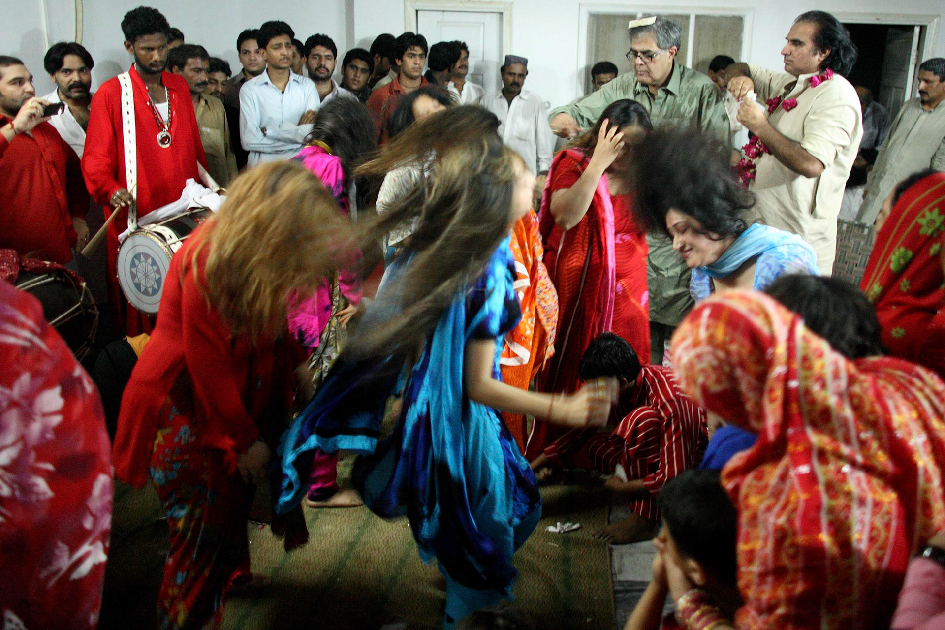 A devotional dance known as Dhamal, being a frenzied and ecstatic swirl of the head and body, is a special ritual that is performed at the rhythmic beat of the dohl ( a double-sided sided barrel drum). (Travel)