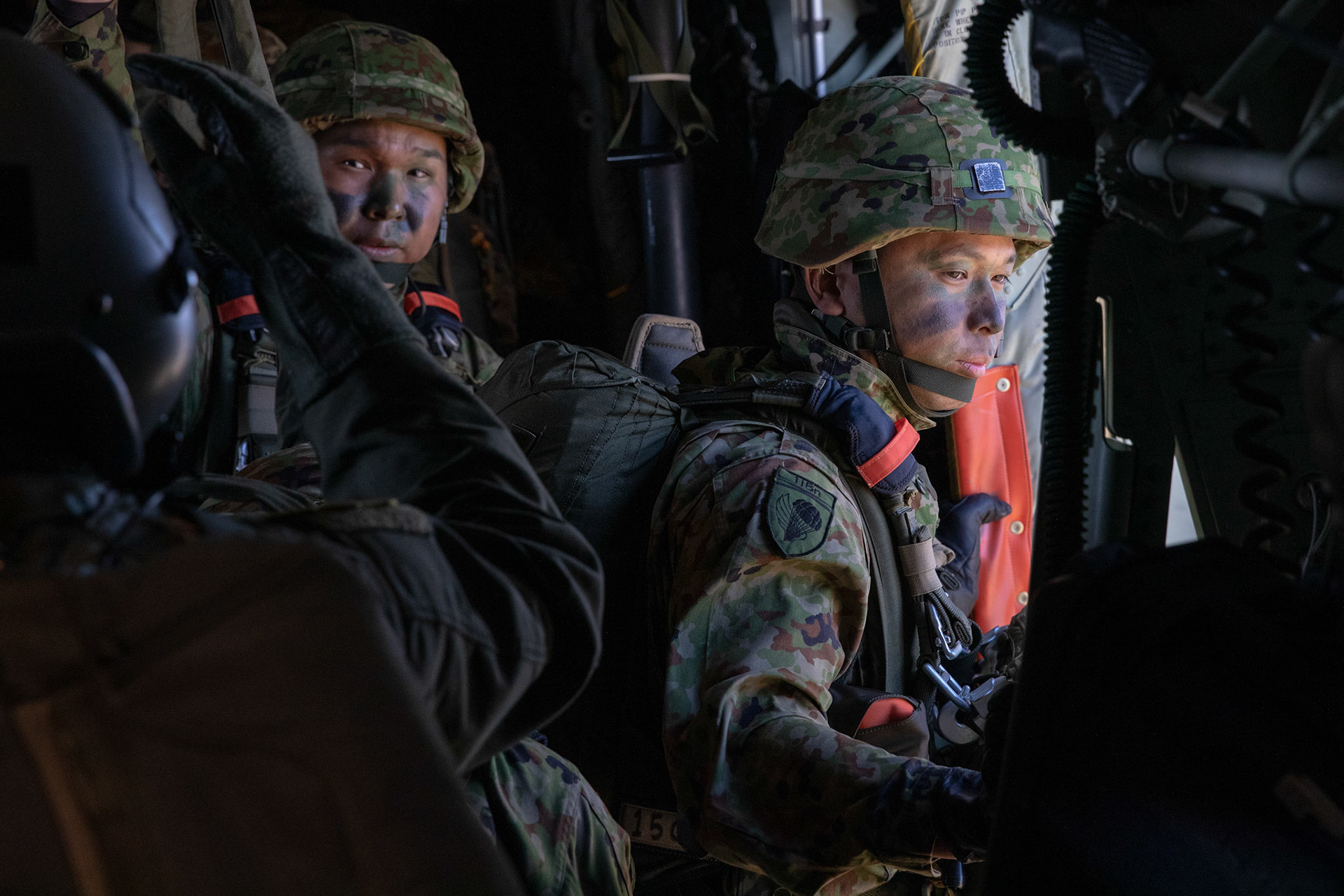 A Japan Ground Self-Defense Force soldier assigned to the 1st Airborne Brigade is ready to jump from a U.S. Air Force C-130J Super Hercules assigned to the 36th Airlift Squadron over Hiju-dai drop zone, Oita prefecture, Japan, Nov. 4, 2018. Approximately 280 JGSDF personnel conducted jump training from U.S. Air Force C-130J Super Hercules’ for the first time in Japan. (U.S. Air Force photo by Yasuo Osakabe)