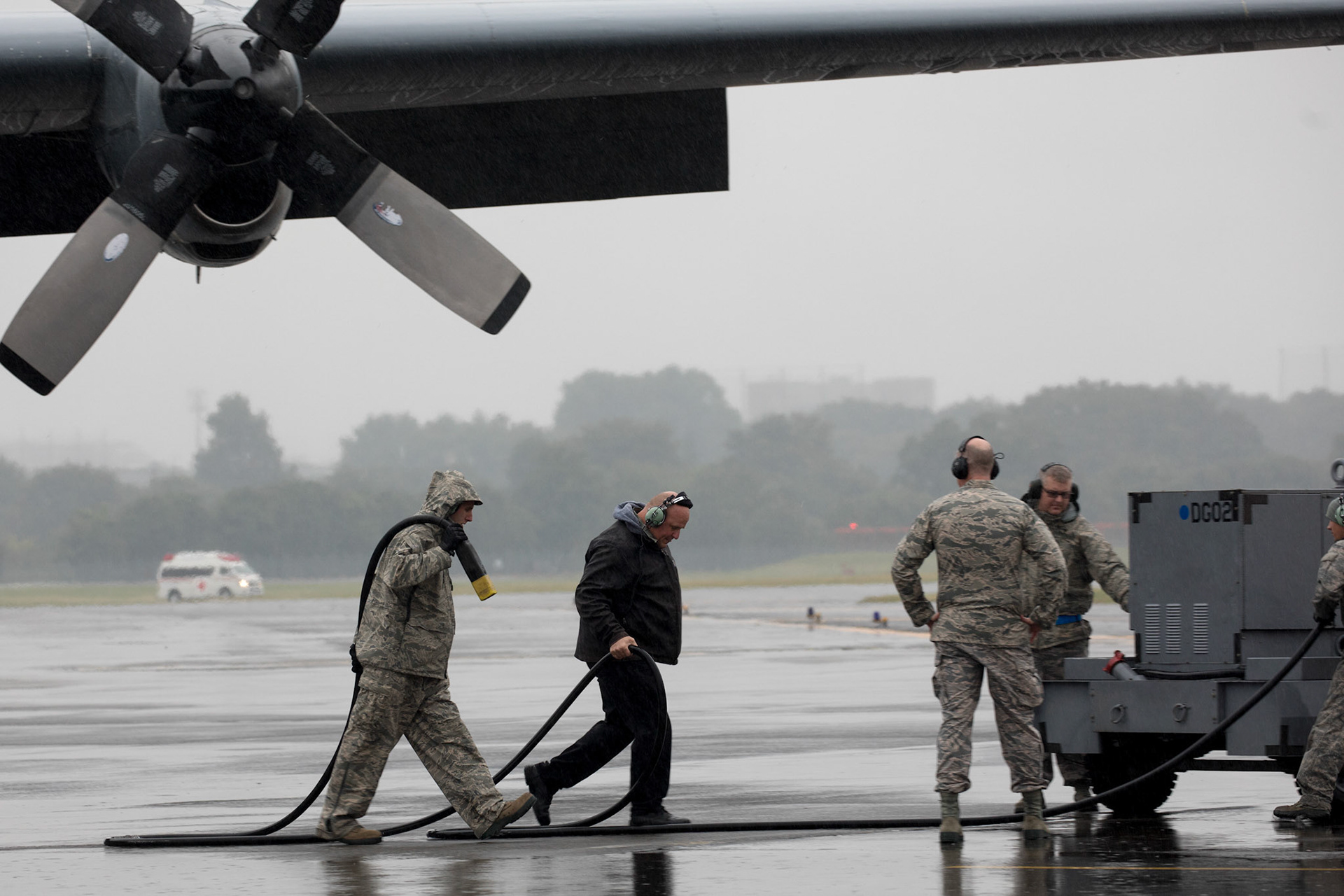 Crew chiefs with the 374th Aircraft Maintenance Squadron disconnect an external power unit from a C-130H Hercules at Yokota Air Base, Japan, Oct. 16, 2017. The 374th AMXS maintained 14 C-130H Hercules aircraft, which were responsible for the tactical airlift of an area of responsibility covering 50 percent of the globe. (U.S. Air Force photo by Yasuo Osakabe)