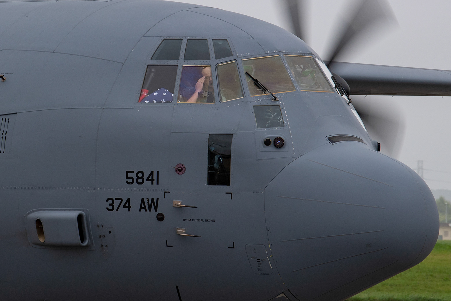 Col. Barry King, 374th Operations Group deputy commander, salutes a crew chief prior to his fini-flight at Yokota Air Base, Japan, July 23, 2019. The fini-flight is time-honored military aviation tradition, marking the last flight of an aircrew member with a unit. (U.S. Air Force photo by Yasuo Osakabe)