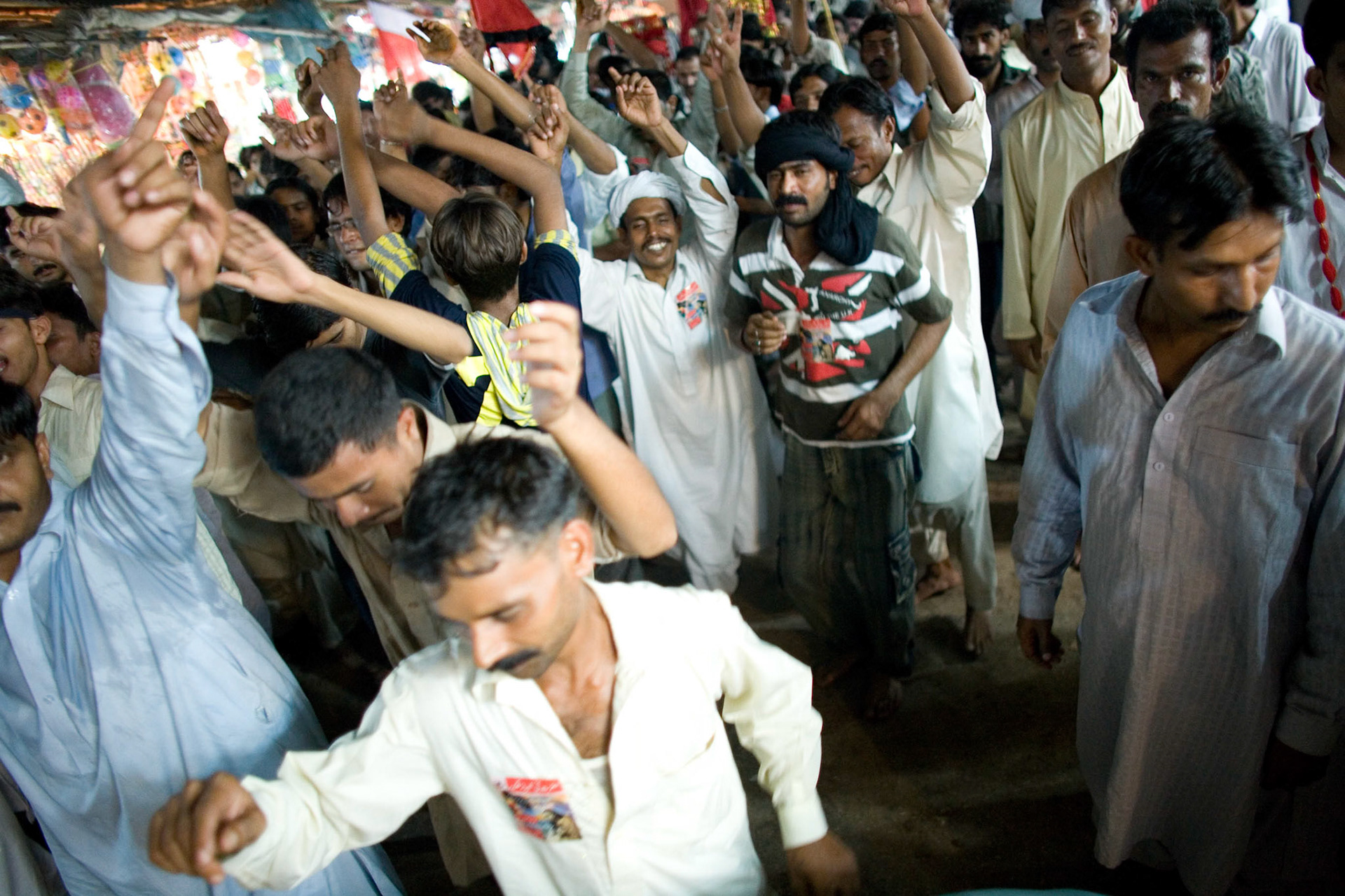 Devotees had been dancing in praise of the saint continues till late at night. (Travel)