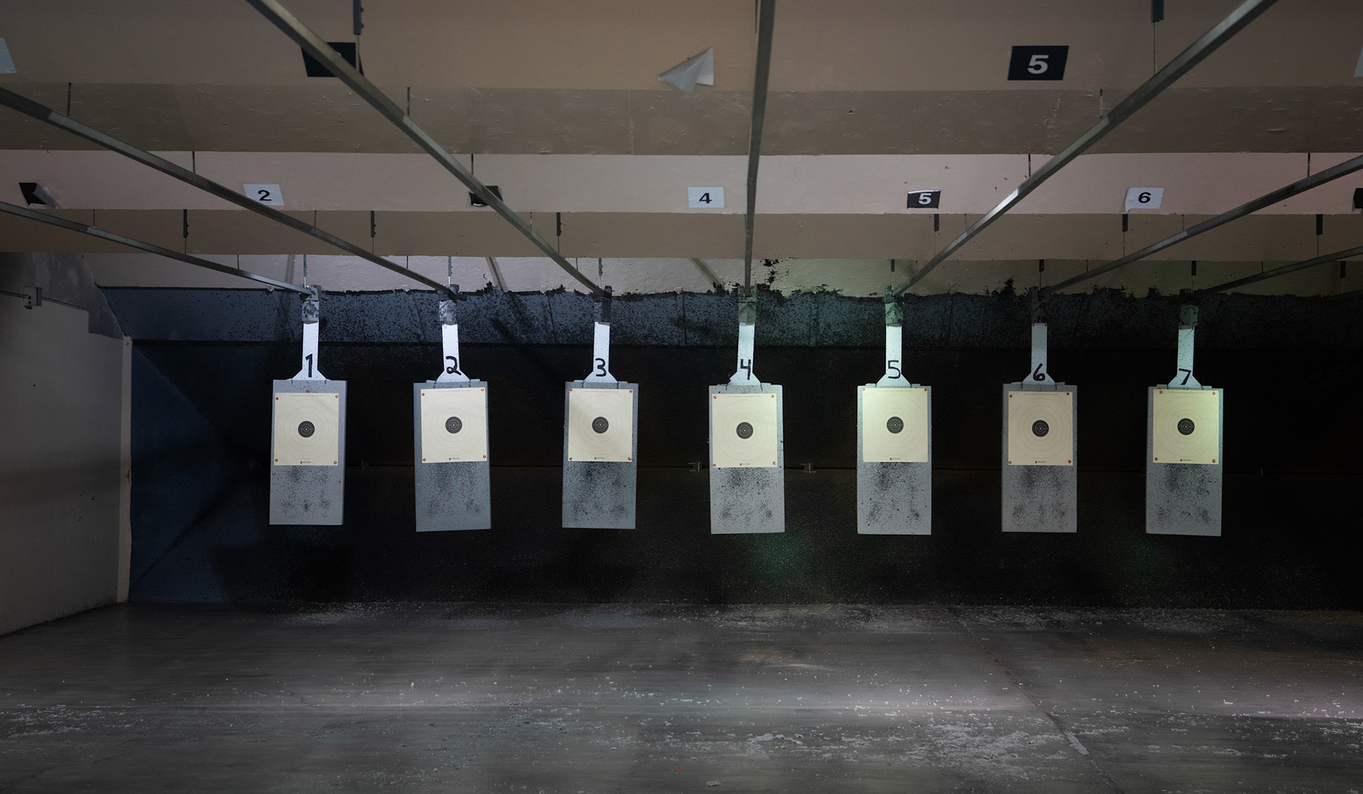 The 374th Security Forces Squadron combat arms training and maintenance section hosts an Excellence-In-Competition M9 Beretta pistol event at Yokota Air Base, Japan, April 12, 2022. The four-day competition was held to boost morale and test 165 active-duty military members on how accurate they can shoot their authorized duty pistols. The top 10% scorers will earn the Air Force Excellence In Competition medal to wear on the Service Dress Uniform. (U.S. Air Force photo by Yasuo Osakabe)