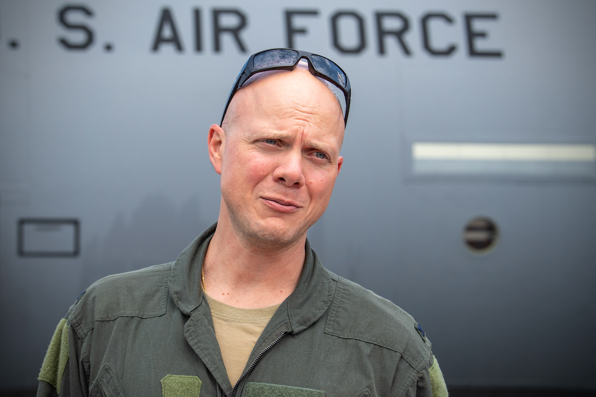 Col. Barry King, 374th Operations Group deputy commander, gives a speech after his fini-flight at Yokota Air Base, Japan, July 23, 2019. King entered the Air Force in 1998 as a graduate of the United States Air Force Academy and earned his pilot wings in 1999. (U.S. Air Force photo by Yasuo Osakabe)
