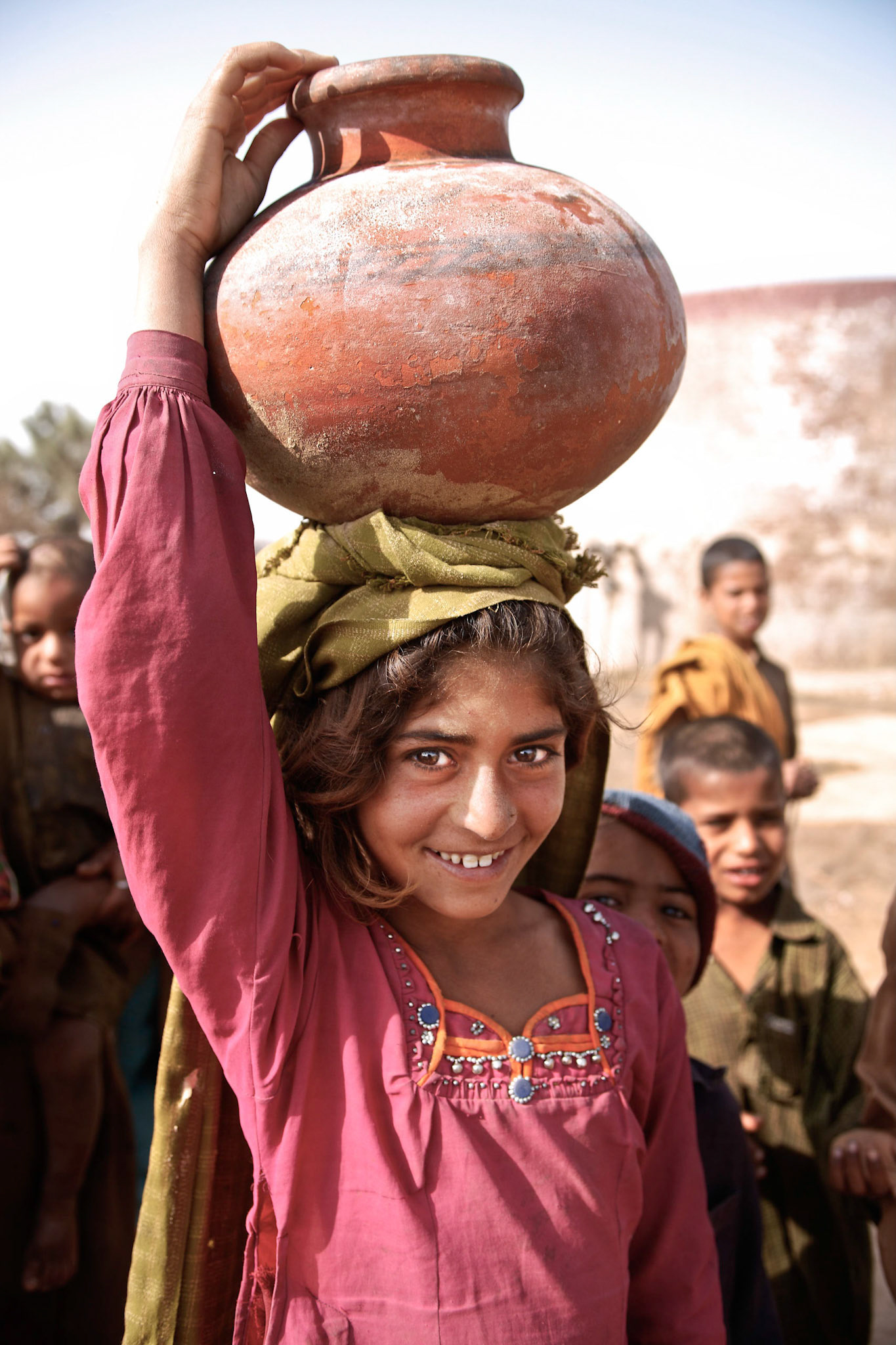 A girl was fetching water in Cholistan desert for her household.