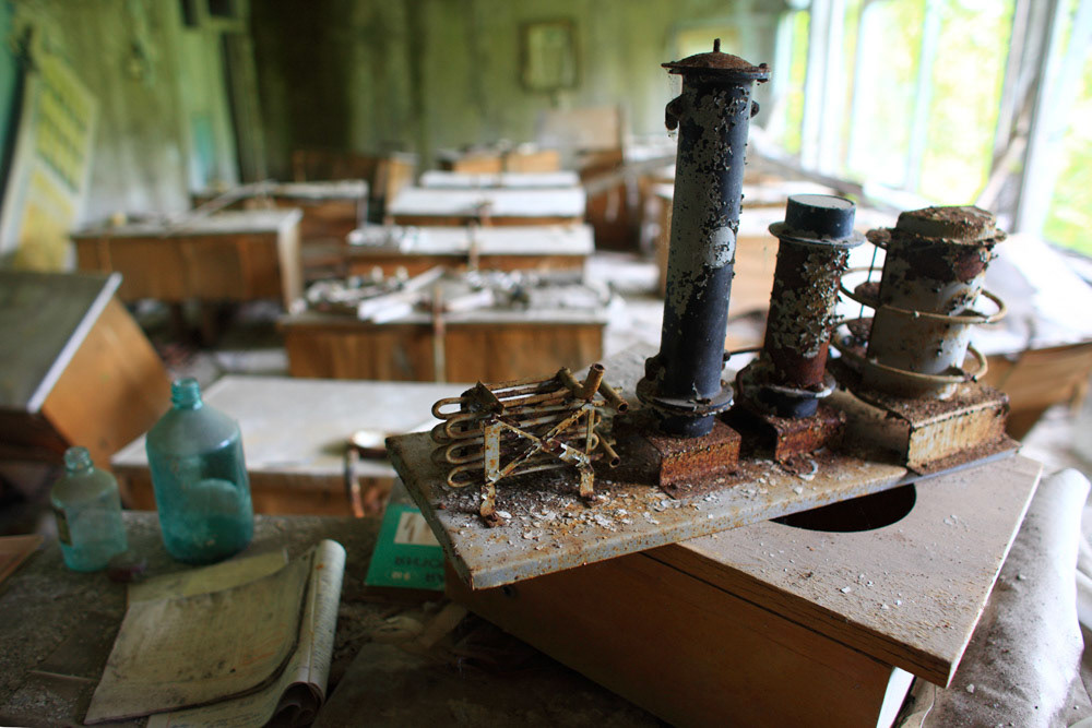 A rusty model experiment has stayed on displaying on a platform at School Chemistry Laboratory, Pripyat.