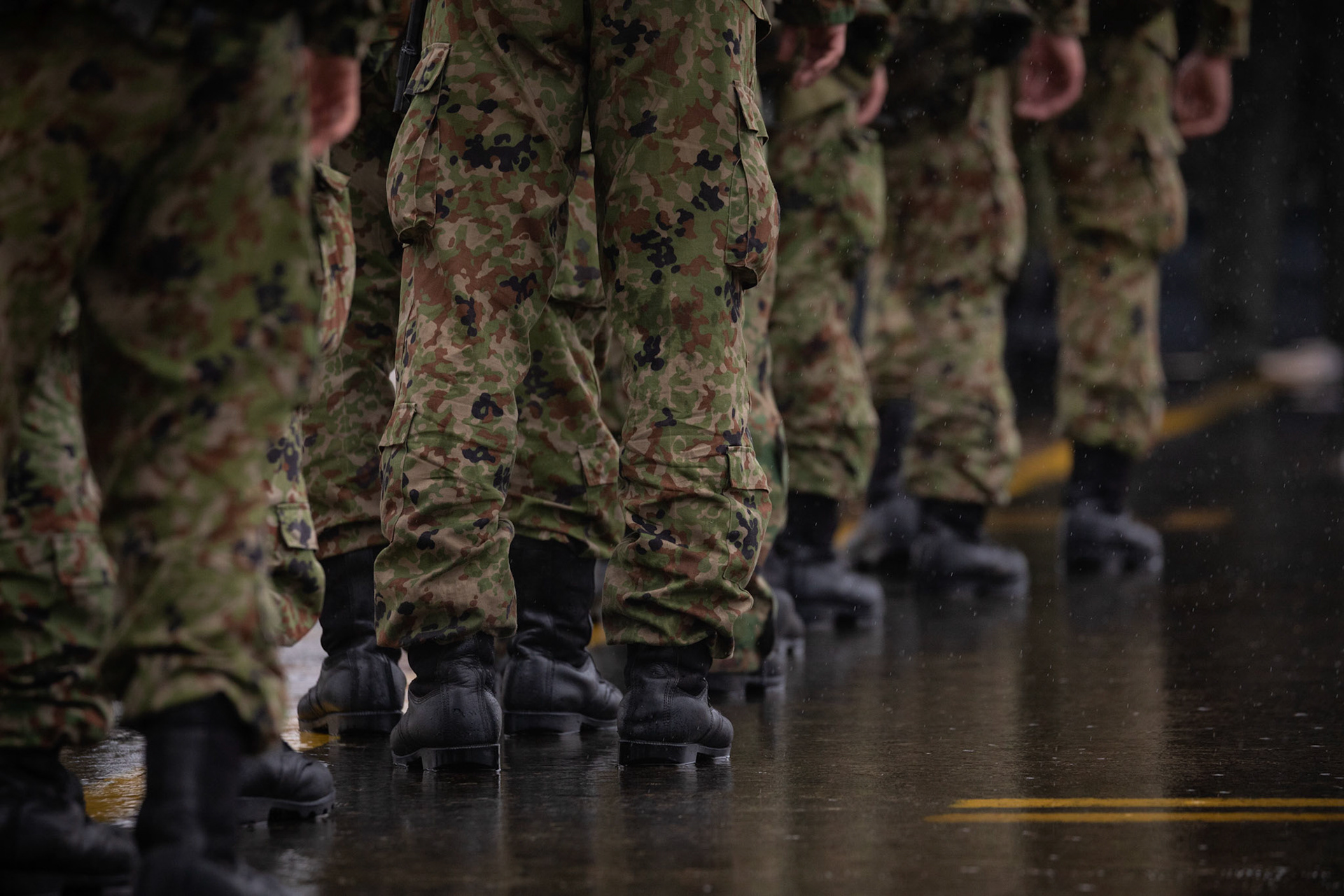 Japan Ground Self-Defense Force soldiers with the 1st Airborne Brigade prepare to board a U.S. Air Force C-130J Super Hercules assigned to the 36th Airlift Squadron at Yokota Air Base, Japan, July 16, 2019, during a bilateral jump training. The training allows USAF and JGSDF units to work alongside each other while improving the readiness of our armed forces. (U.S. Air Force photo by Yasuo Osakabe)