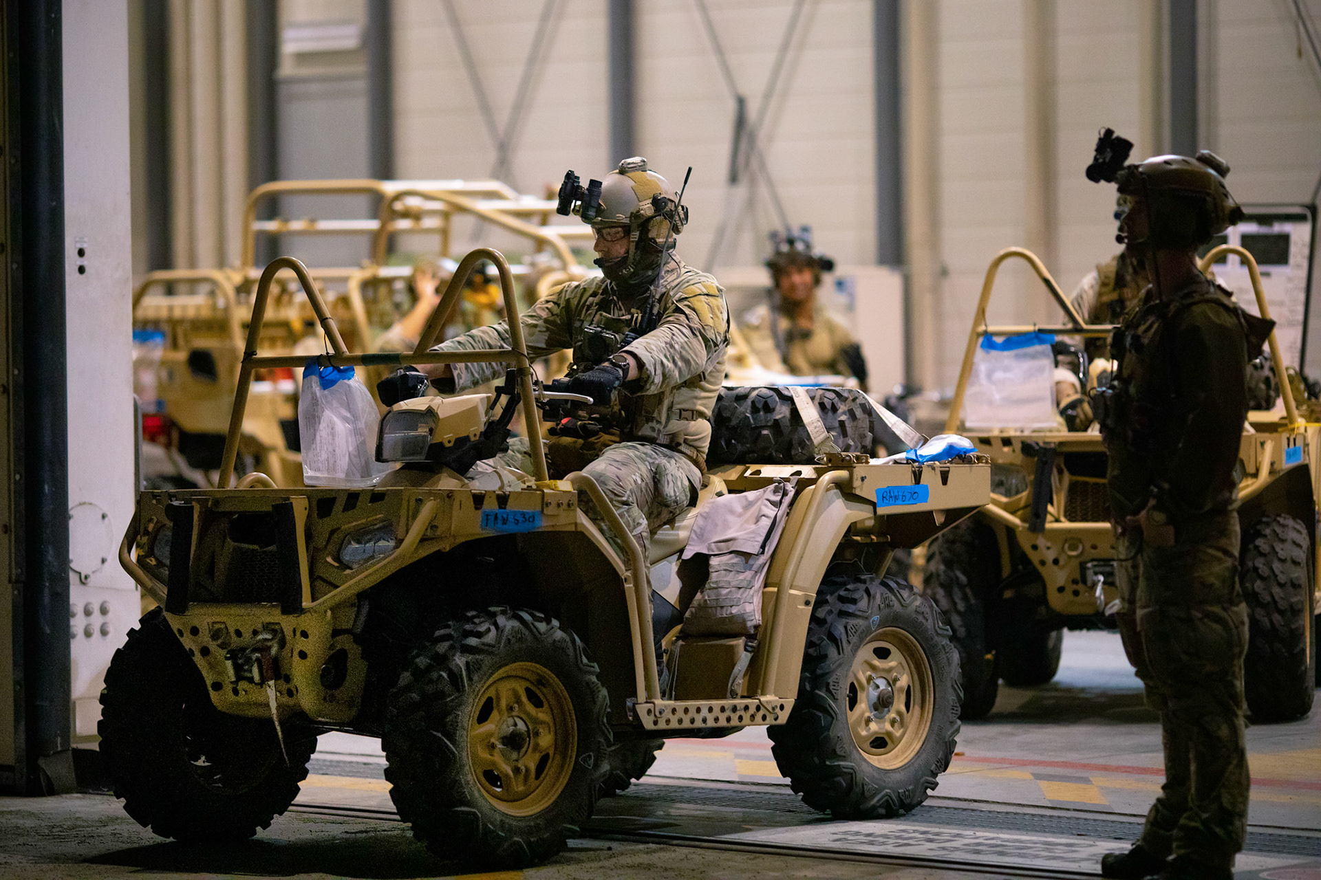 Air Force Special Tactics operators with the 320th Special Tactics Squadron out of Kadena Air Base, Japan wait for an Air Force C-130J Super Hercules arrival at Yokota Air Base, Japan, June 23, 2020, during Exercise Gryphon Jet. Special Tactics is a U.S. Special Operation Command's tactical air and ground integration force, and the Air Force's special operations ground force, leading Global Access, Precision Strike, Personnel Recovery and Battlefield Surgery operations on the battlefield. Exercise Gryphon Jet is an integrated training exercise focused on improving interoperability throughout the special operations community. (U.S. Air Force photo by Yasuo Osakabe)