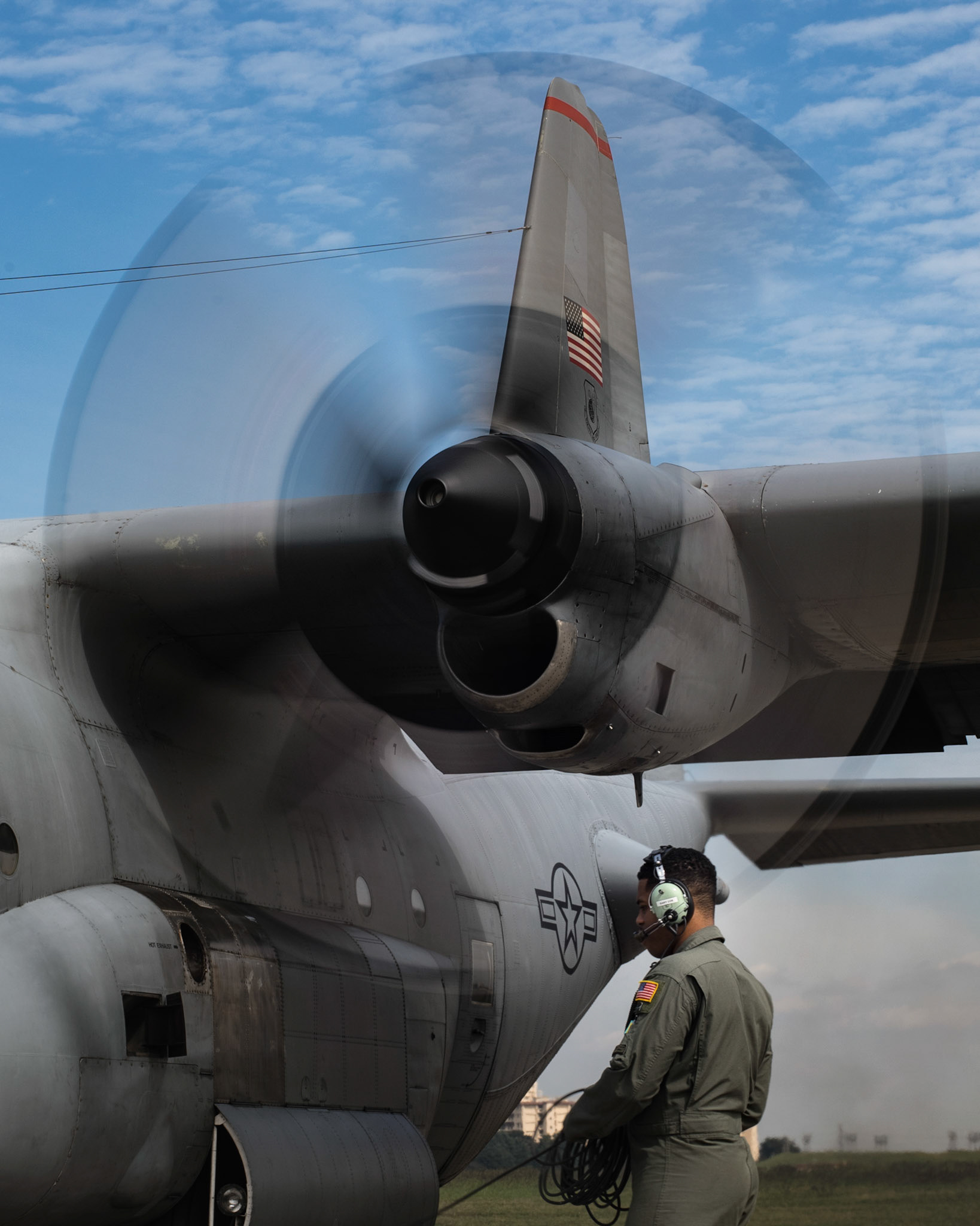 Senior Airman Gary Coe, 36th Airlift Squadron C-130H loadmaster, completes a pre-flight inspection of a C-130H Hercules at Yokota Air Base, Japan, Oct. 5, 2017. This is the last active duty C-130H Hercules tactical training sortie. (U.S. Air Force photo by Yasuo Osakabe)