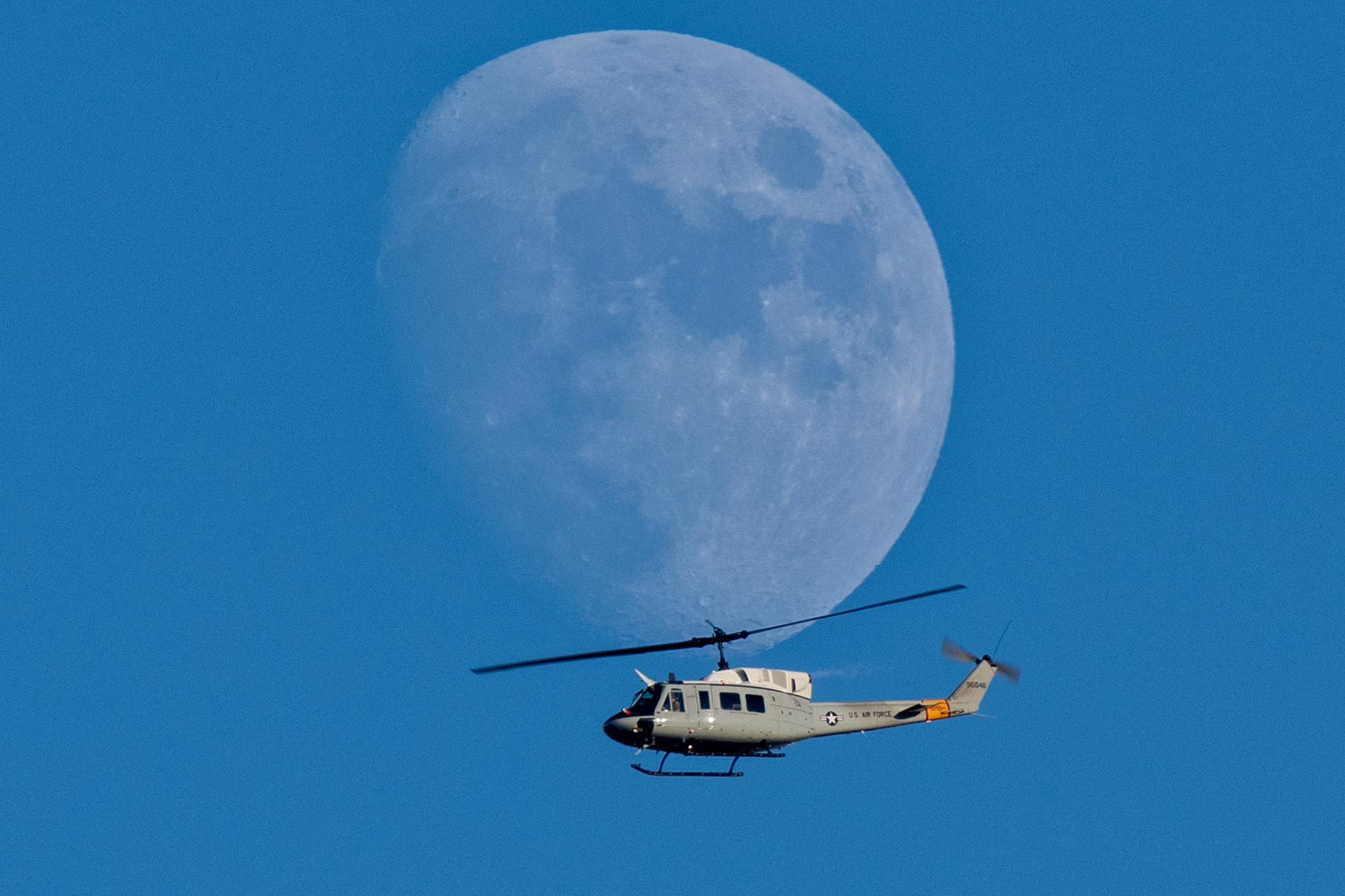 A UH-1N Iroquois assigned to the 459th Airlift Squadron conducts a training mission over Yokota Air Base, Japan, Nov. 15, 2021. Yokota’s UH-1Ns are primarily used for local airlift, but they are also equipped with hoist capabilities and can be used for search and rescue operations.(U.S. Air Force photo by Osakabe Yasuo)