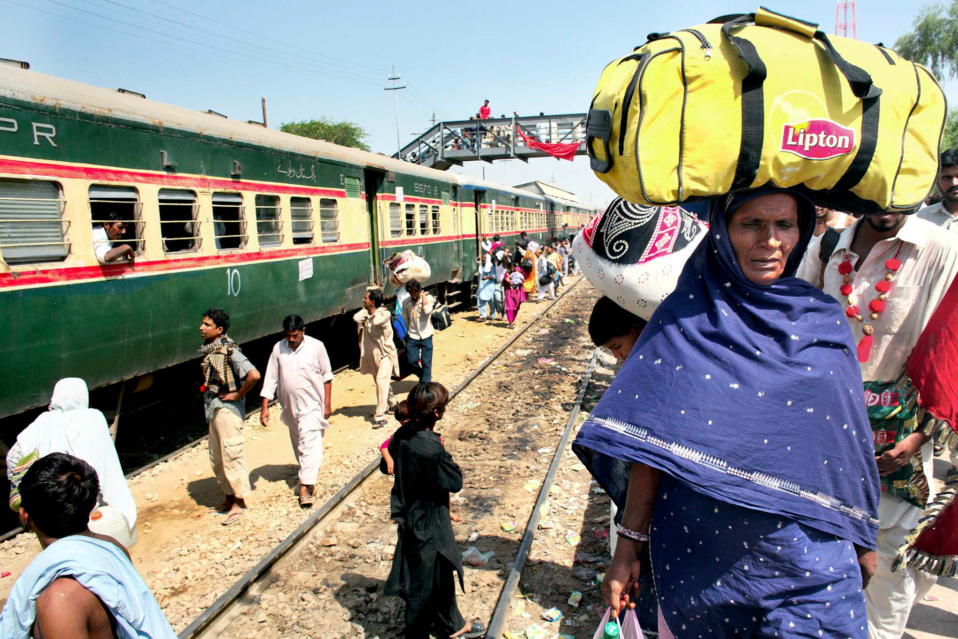Thousands of devotees from Lahore were going back home by the pilgrim train after the festival.(Travel)