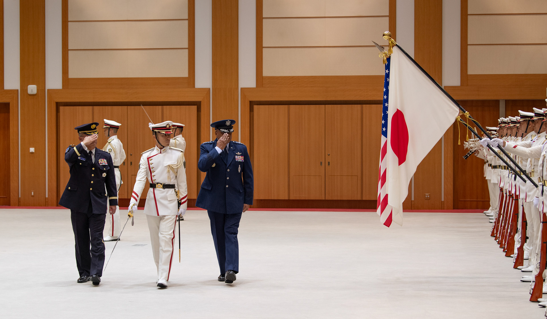 U.S. Air Force Gen. Anthony J. Cotton, commander, U.S. Strategic Command (USSTRATCOM), and Japan Ground Self-Defense Force (JGSDF) Gen. Yoshihide Yoshida, chief of staff of the Joint Staff, salute members of the JGSDF Honor Guard during a pass and review at the Ministry of Defense in Tokyo, Japan, Sept. 4, 2023. The JGSDF held a welcoming ceremony for Gen. Cotton as part of his first visit to the region as USSTRATCOM commander. (U.S. Air Force photo by Yasuo Osakabe)