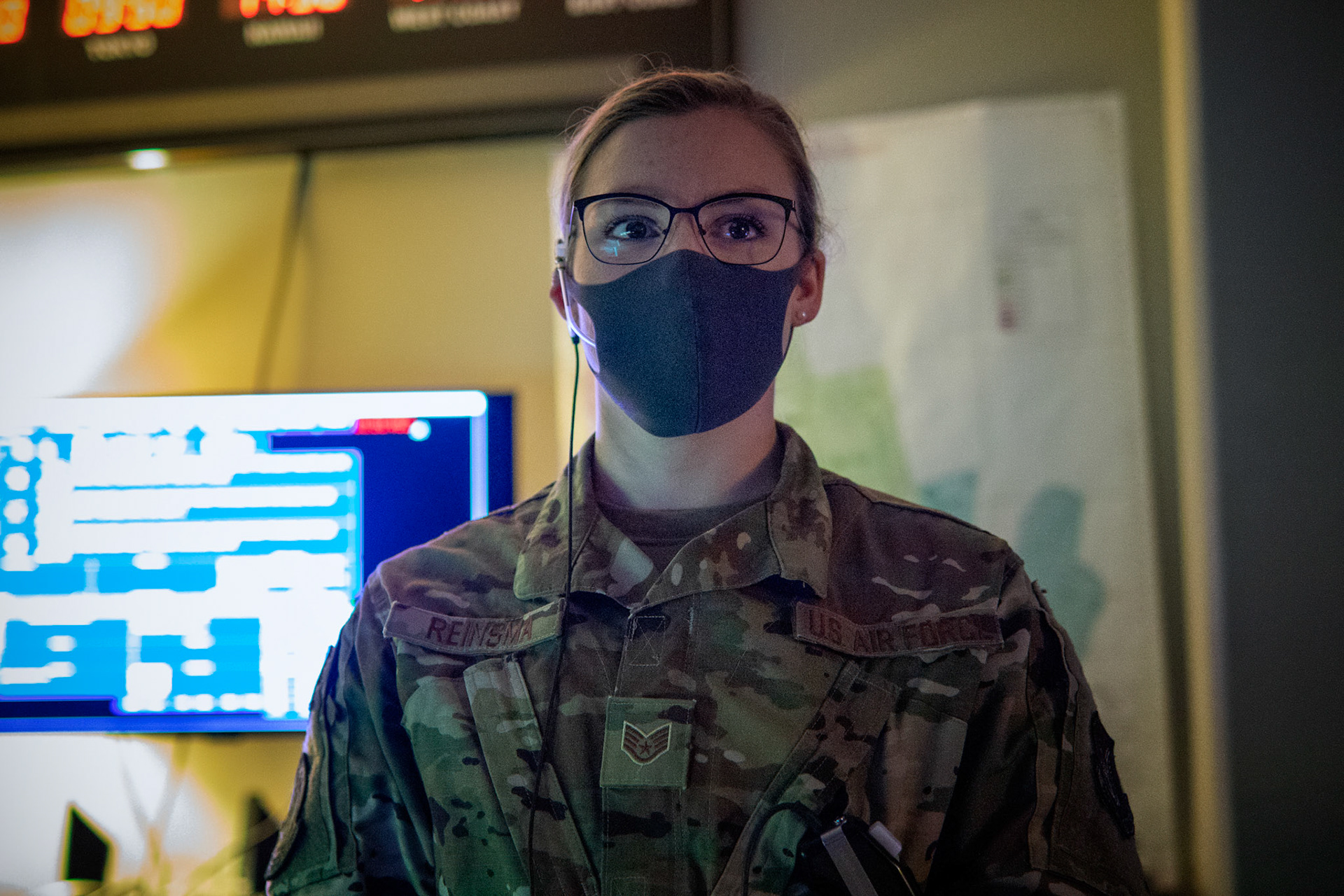 Staff Sgt. Tessa Reinsma, 374th Operations Support Squadron air traffic controller watch supervisor, performs daily operations with the radar approach control, June 11, 2020 at Yokota Air Base, Japan. Yokota's RAPCON members play a direct role in the wing's ability to conduct mission essential flight operations. (U.S. Air Force photo by Yasuo Osakabe)