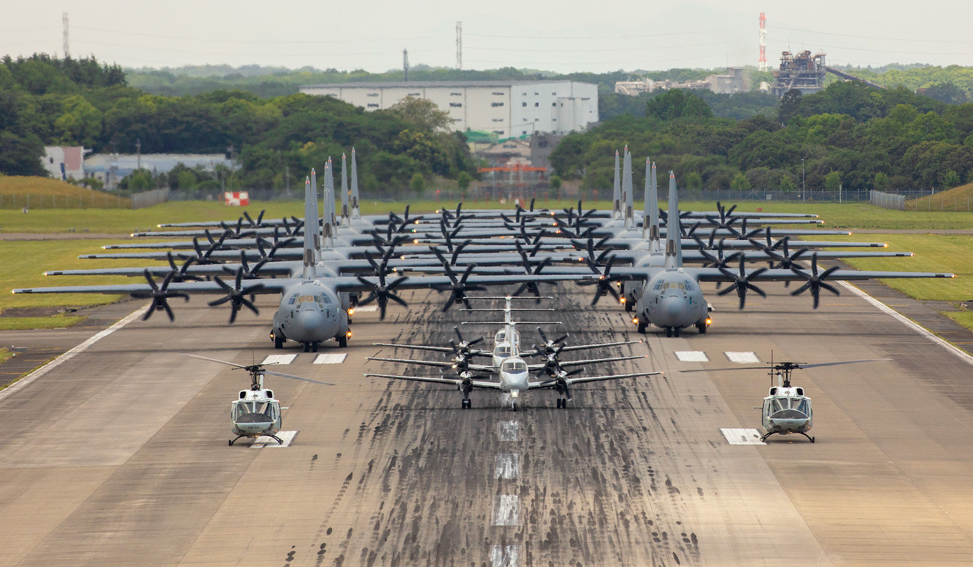 Aircraft from the 374th Airlift Wing (AW) conduct the 374th AW Generation Exercise Elephant Walk at Yokota Air Base, Japan, May 4, 2018. The exercise was conducted in order to demonstrate the wing’s ability to rapidly deploy forces across Indo-Pacific region. The 374th AW maintains and operates the C-130J Super Hercules, C-12 Huron, and UH-1N Iroquois, making it the primary Western Pacific airlift hub for U.S. Air Force peacetime and contingency operations. (U.S. Air Force photo by Yasuo Osakabe)