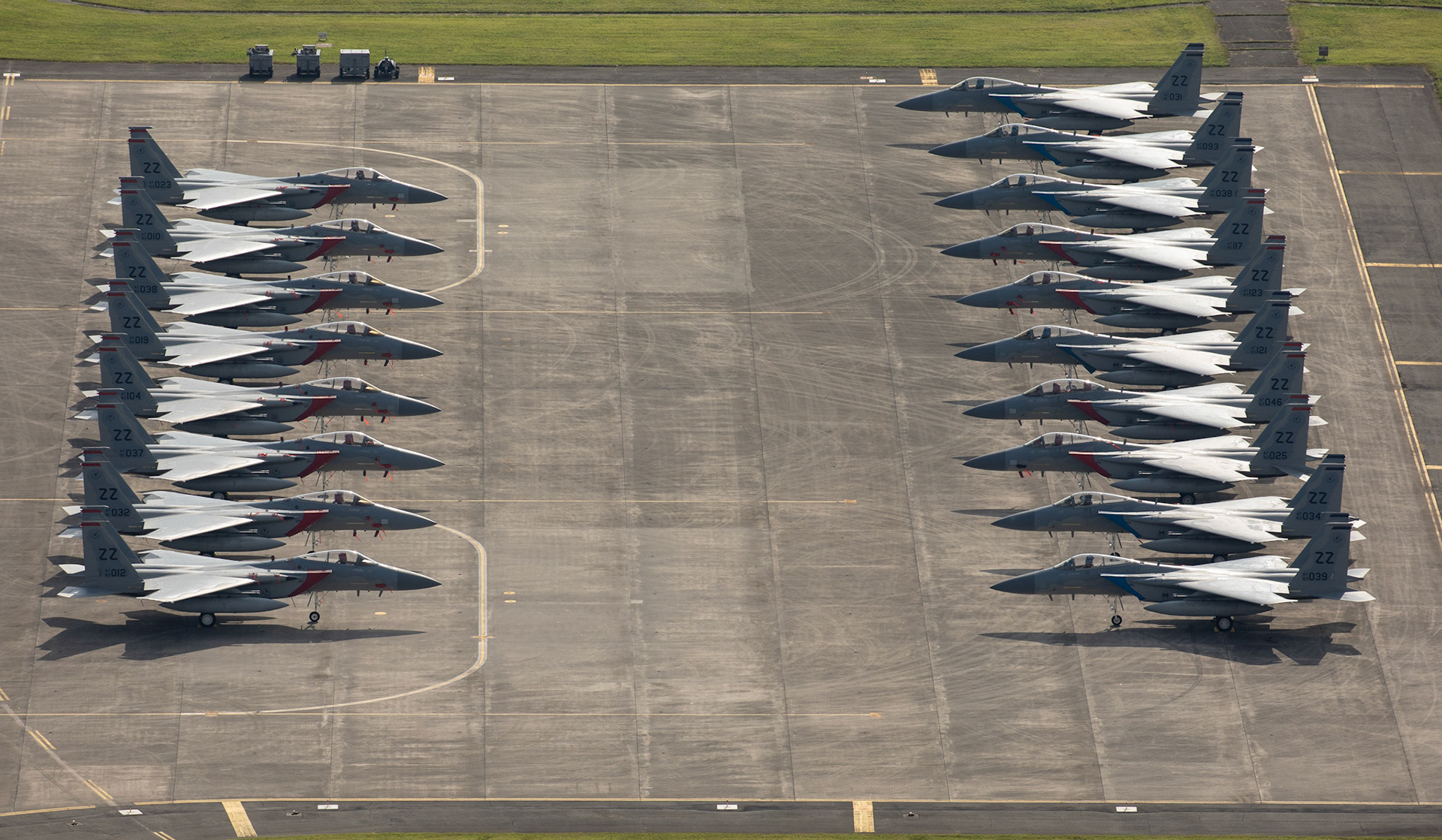 Eighteen U.S. Air Froce F-15 Eagles from Kadena Air Base are parked on the ramp, July 9, 2018, at Yokota Air Base, Japan. The F-15s evacuated due to Typhoon Maria. This is the most aircraft to ever evacuate to Yokota AB from Kadena AB. (U.S. Air Force photo by Yasuo Oaskabe)