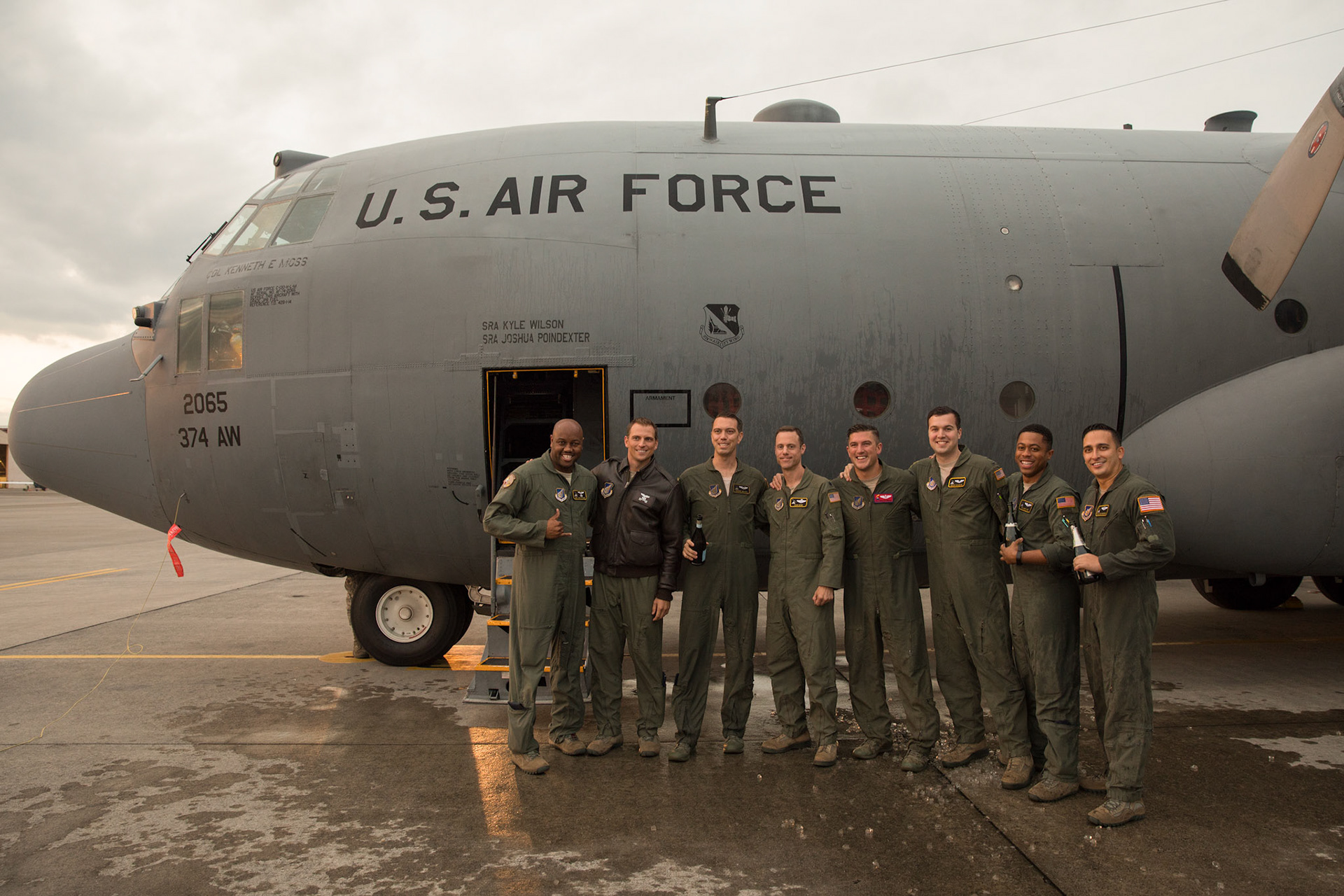 Crew members from the 36th Airlift Squadron pose for a photo in front of a C-130H Hercules, tail #74-2065 at Yokota Air Base, Japan, Oct. 5, 2017. This is the last active duty C-130H Hercules tactical training sortie. (U.S. Air Force photo by Yasuo Osakabe)