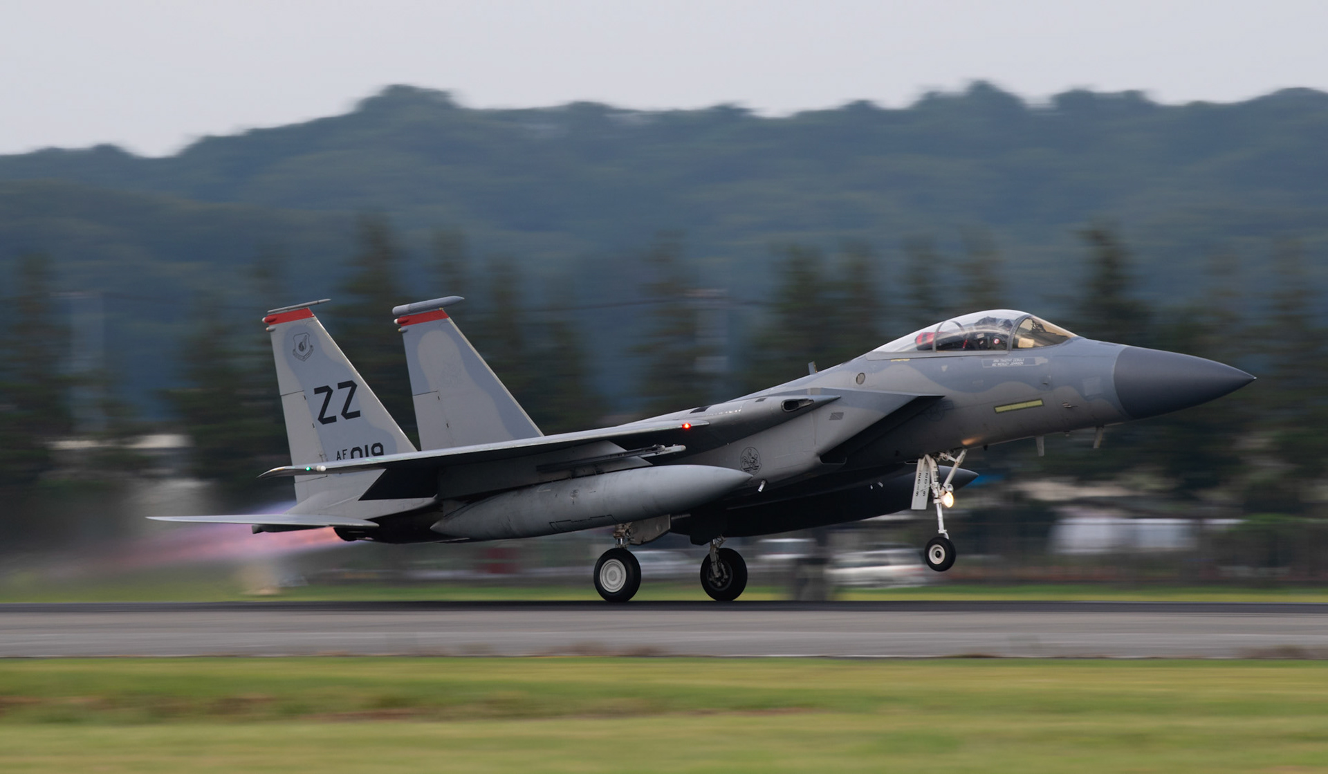 A U.S. Air Force F-15 Eagle assigned to the 67th Fighter Squadron, Kadena Air Base, Japan, takes off at Yokota Air Base, Japan, July 11, 2018, after Tropical Cyclone Conditions of Readiness (TCCOR) is declared All Clear at Kadena. Eighteen F-15 Eagle fighters evacuated to Yokota due to Typhoon Maria. The F-15 Eagle is a purpose-built air superiority fighter capable of detecting, acquiring and tracking enemy aircraft.(U.S. Air Force photo by Yasuo Osakabe)
