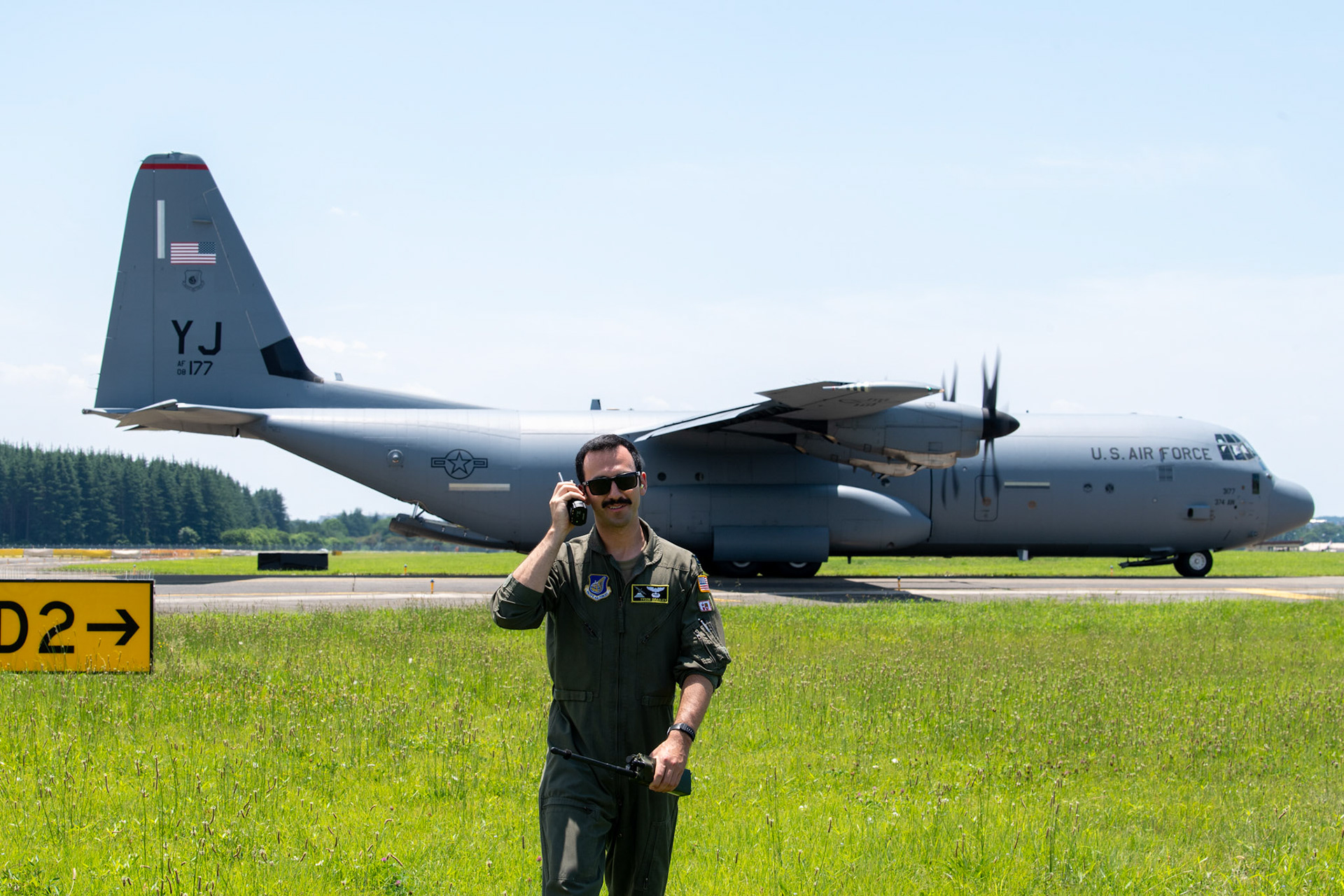 Air Force Capt. Tyson Bradley, 36th Airlift Squadron C-130J pilot, communicates with C-130J pilots during Exercise Gryphon Jet at Yokota Air Base, Japan, June 17, 2020. Gryphon Jet is an integrated training exercise focused on improving interoperability throughout the special operations community. (U.S. Air Force photo by Yasuo Osakabe)