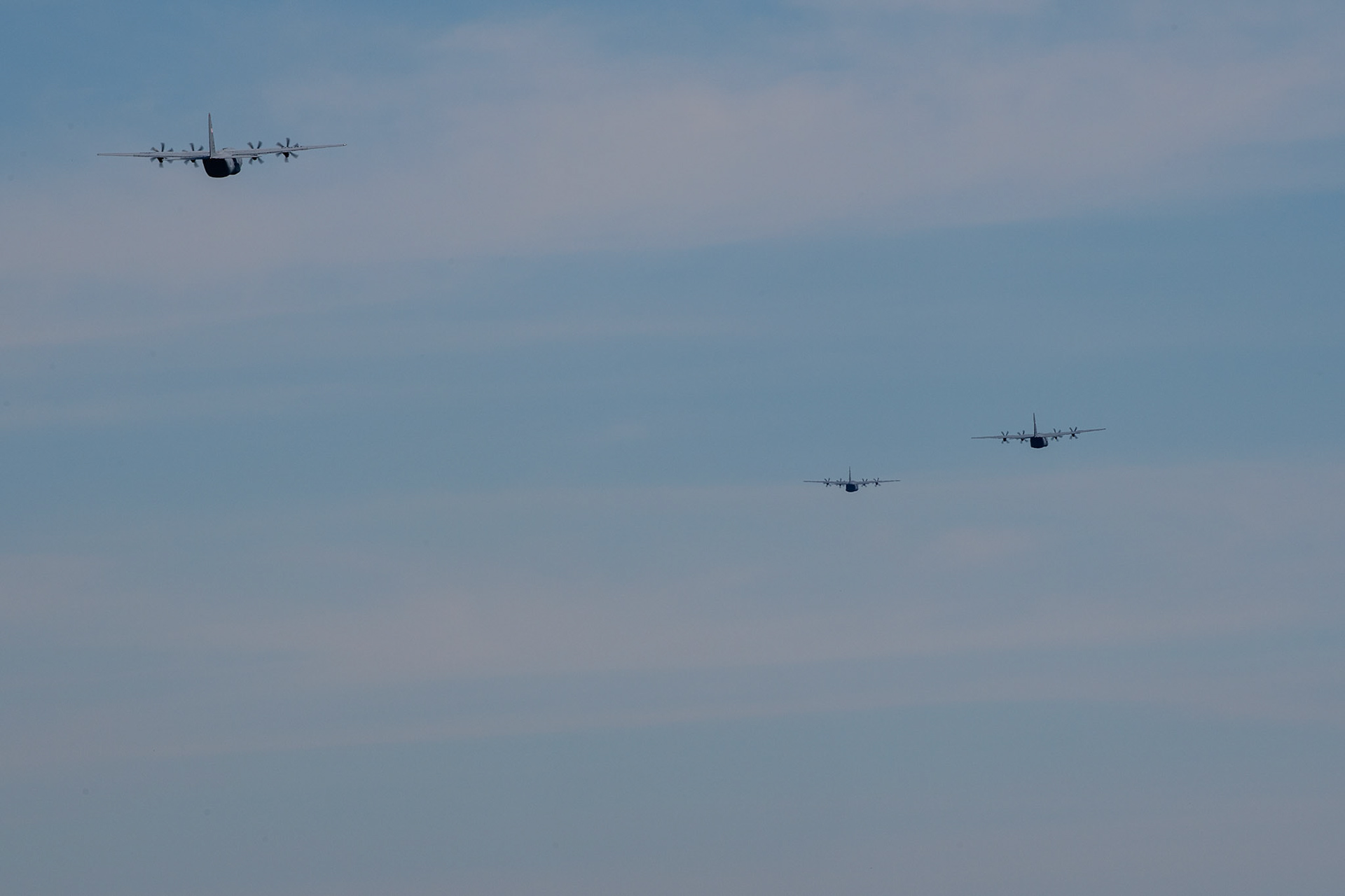 Three C-130J Super Hercules assigned to the 36th Airlift Squadron fly in formation at Yokota Air Base, Japan, June 17, 2020, during Exercise Gryphon Jet. Gryphon Jet is an integrated training exercise focused on improving interoperability throughout the special operations community. (U.S. Air Force photo by Yasuo Osakabe)