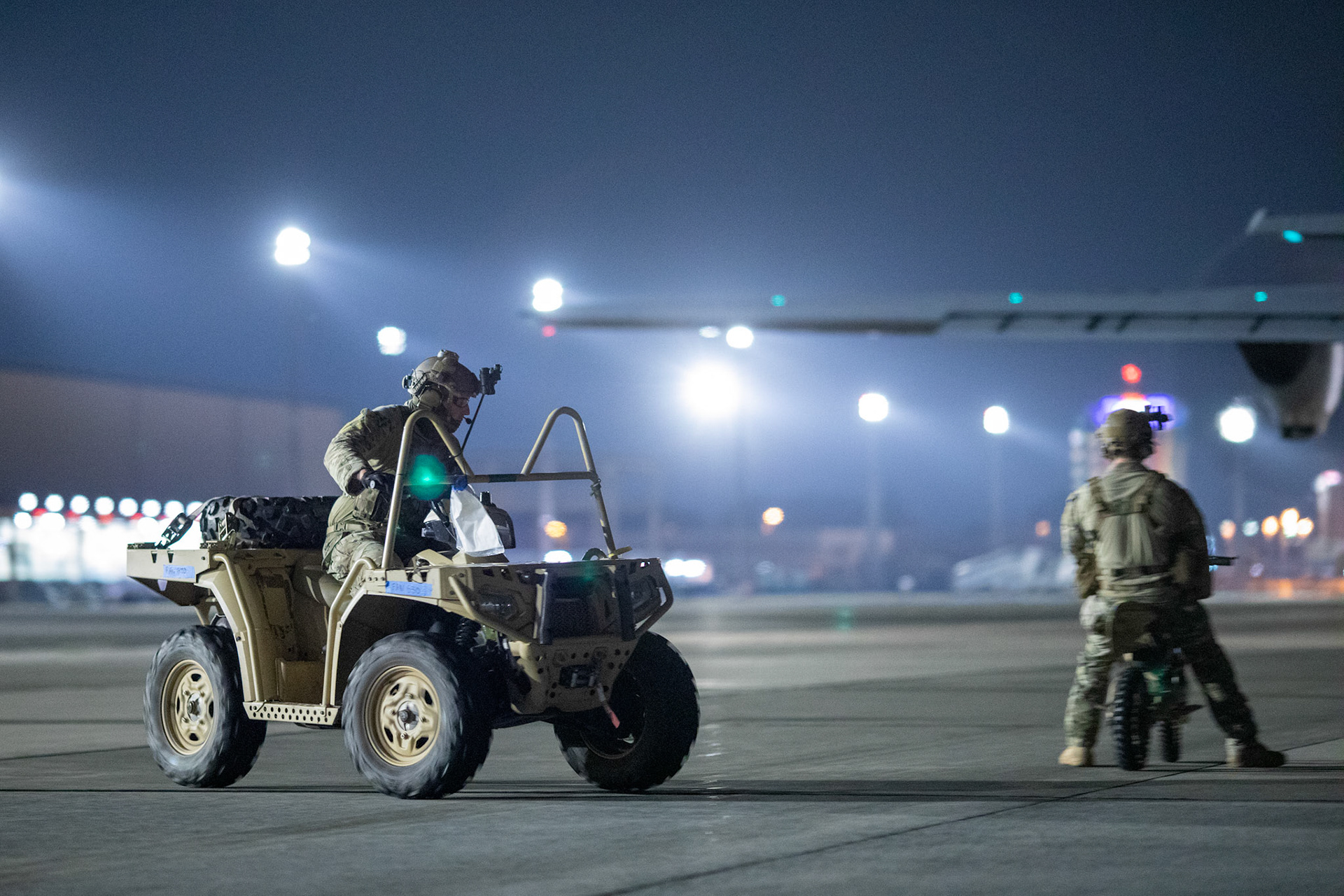 U.S. Air Force Special Tactics operators with the 320th Special Tactics Squadron out of Kadena Air Base, Japan, drive tactical vehicle loading into a C-130J Super Hercules during an engine running onload/offload (ERO) training as part of Exercise Gryphon Jet at Yokota Air Base, Japan, June 23, 2020. Special Tactics is a U.S. Special Operation Command's tactical air and ground integration force, and the Air Force's special operations ground force, leading Global Access, Precision Strike, Personnel Recovery and Battlefield Surgery operations on the battlefield. Exercise Gryphon Jet is an integrated training exercise focused on improving interoperability throughout the special operations community. (U.S. Air Force photo by Yasuo Osakabe)