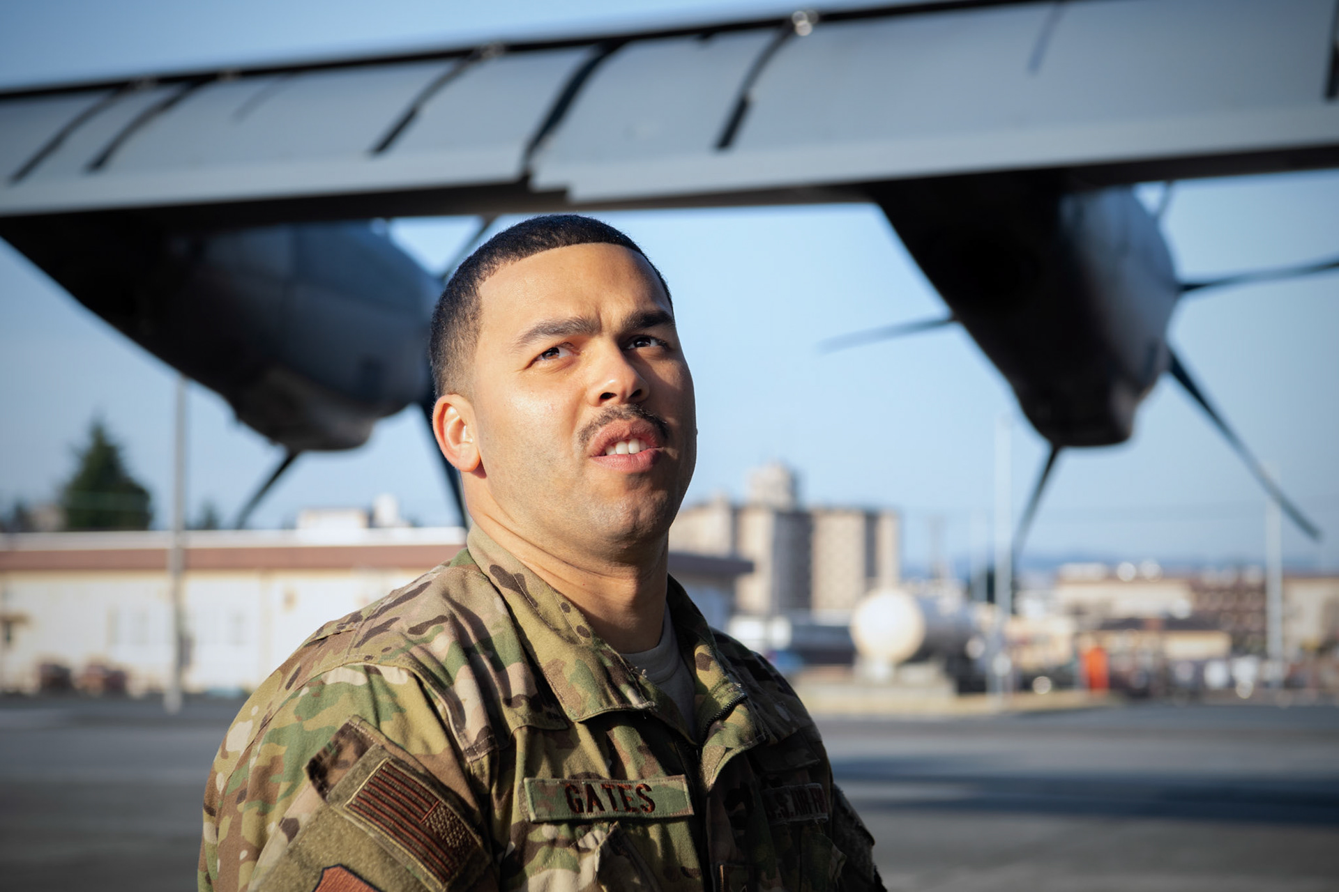 Tech. Sgt. Brian Gates, 36th Airlift Squadron C-130J loadmaster, completes loading bundles onto a C-130J Super Hercules during the Yokota C-130J Rodeo at Yokota Air Base, Japan, March 22, 2019. The Rodeo is a tactical airlift competition between flights within the 36th Airlift Squadron and 374th Operations Support Squadron, whose goal is to demonstrate capabilities, improve procedures, and enhance standardization for global operations.  (U.S. Air Force photo by Yasuo Osakabe)