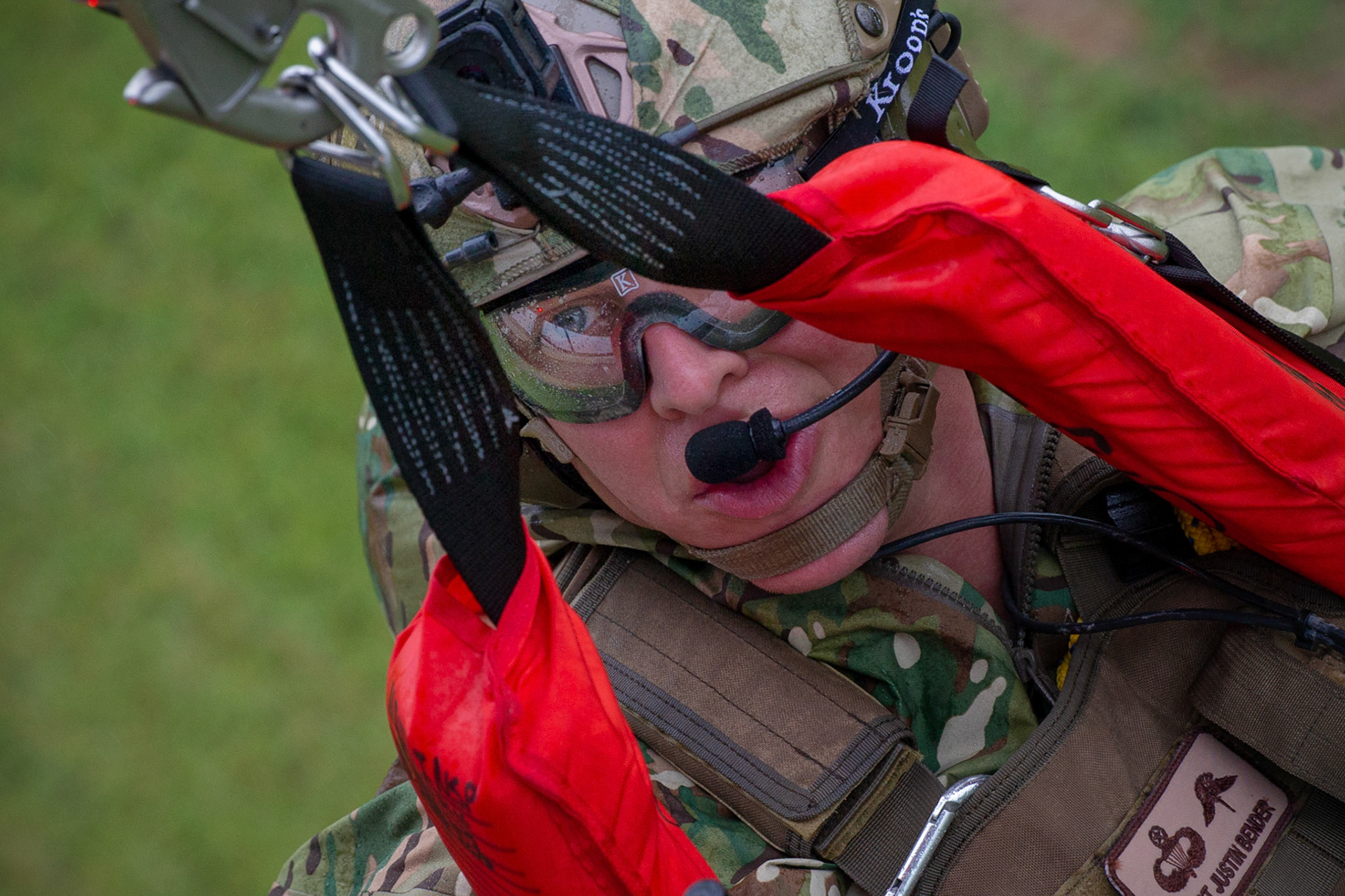 Tech. Sgt. Justin Bender, 374th Operations Support Squadron survival, evasion, resistance and escape specialist, is hoisted into a UH-1N Iroquois during a Capabilities Exercise as part of the 2018 Japanese-American Friendship Festival at Yokota Air Base, Japan, Sept. 15, 2018. Members with the 459th AS showcased their rescue capabilities to execute search-and-rescue mission. (U.S. Air Force photo by Yasuo Osakabe)