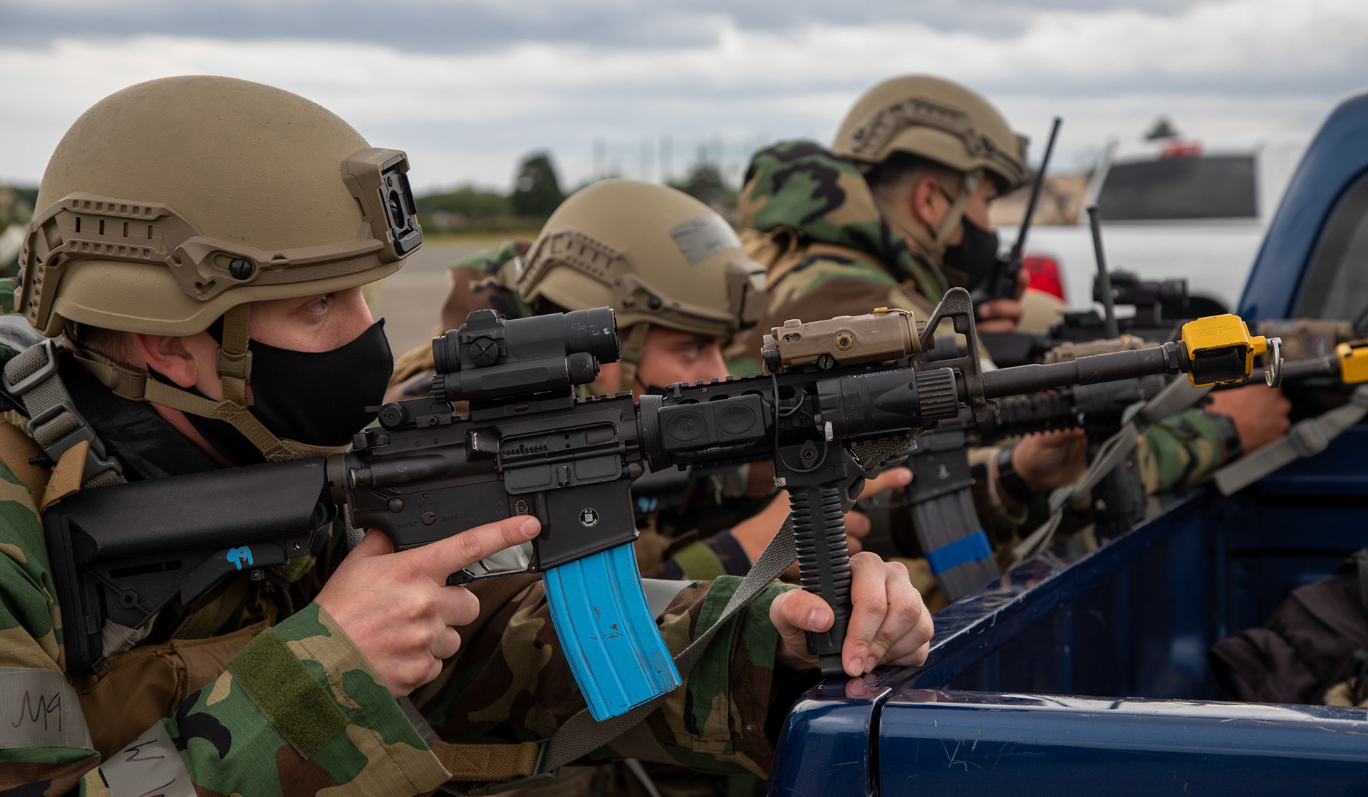 Patrolmen with the 374th Security Forces Squadron prepare to secure an aircraft and its passengers during an anti-hijacking exercise on the flightline at Yokota Air Base, Japan, May 5, 2021. Team Yokota members participated in a two-week-long Samurai Readiness Inspection exercise which ensures the base is ready to respond to potential contingencies in the area. (U.S. Air Force photo by Yasuo Osakabe)