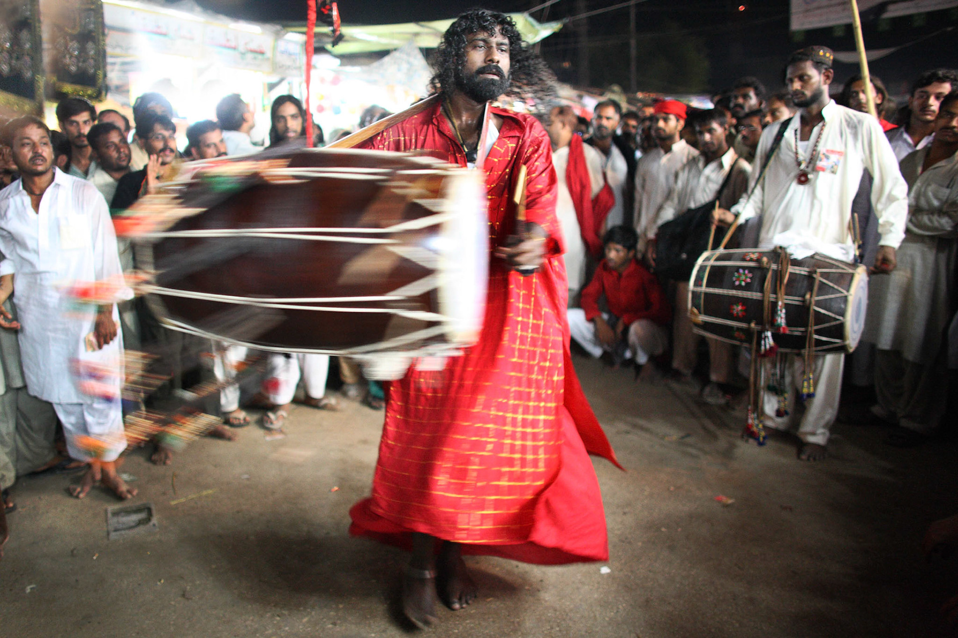 The most exciting moments came when Gonga sain (centre) had revolved ceaselessly his dhol in the air. (Travel)