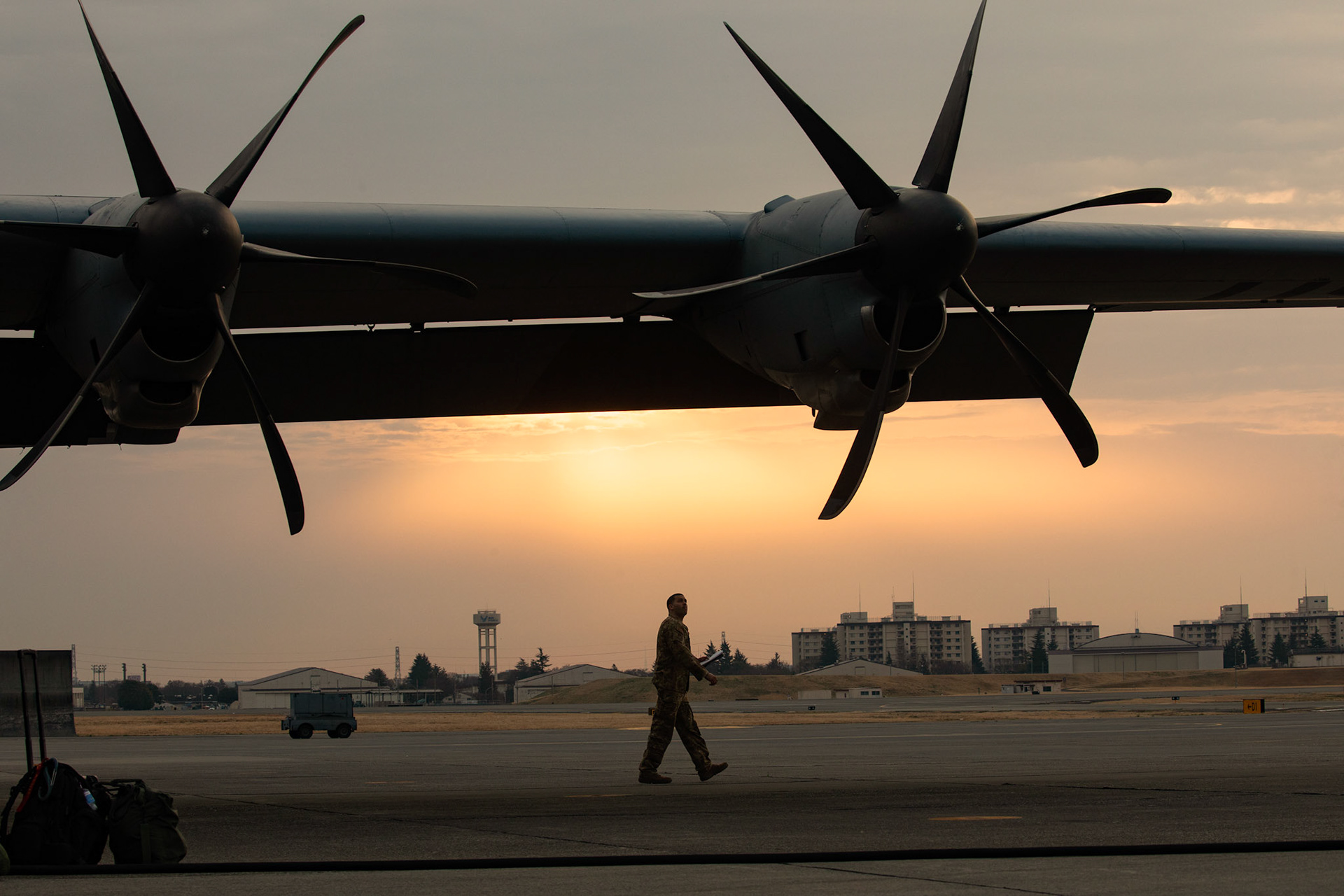 Tech. Sgt. Brian Gates, 36th Airlift Squadron C-130J loadmaster, performs a pre-flight inspection during the Yokota C-130J Rodeo at Yokota Air Base, Japan, March 22, 2019. The Rodeo is a tactical airlift competition between flights within the 36th Airlift Squadron and 374th Operations Support Squadron, whose goal is to demonstrate capabilities, improve procedures, and enhance standardization for global operations.  (U.S. Air Force photo by Yasuo Osakabe)
