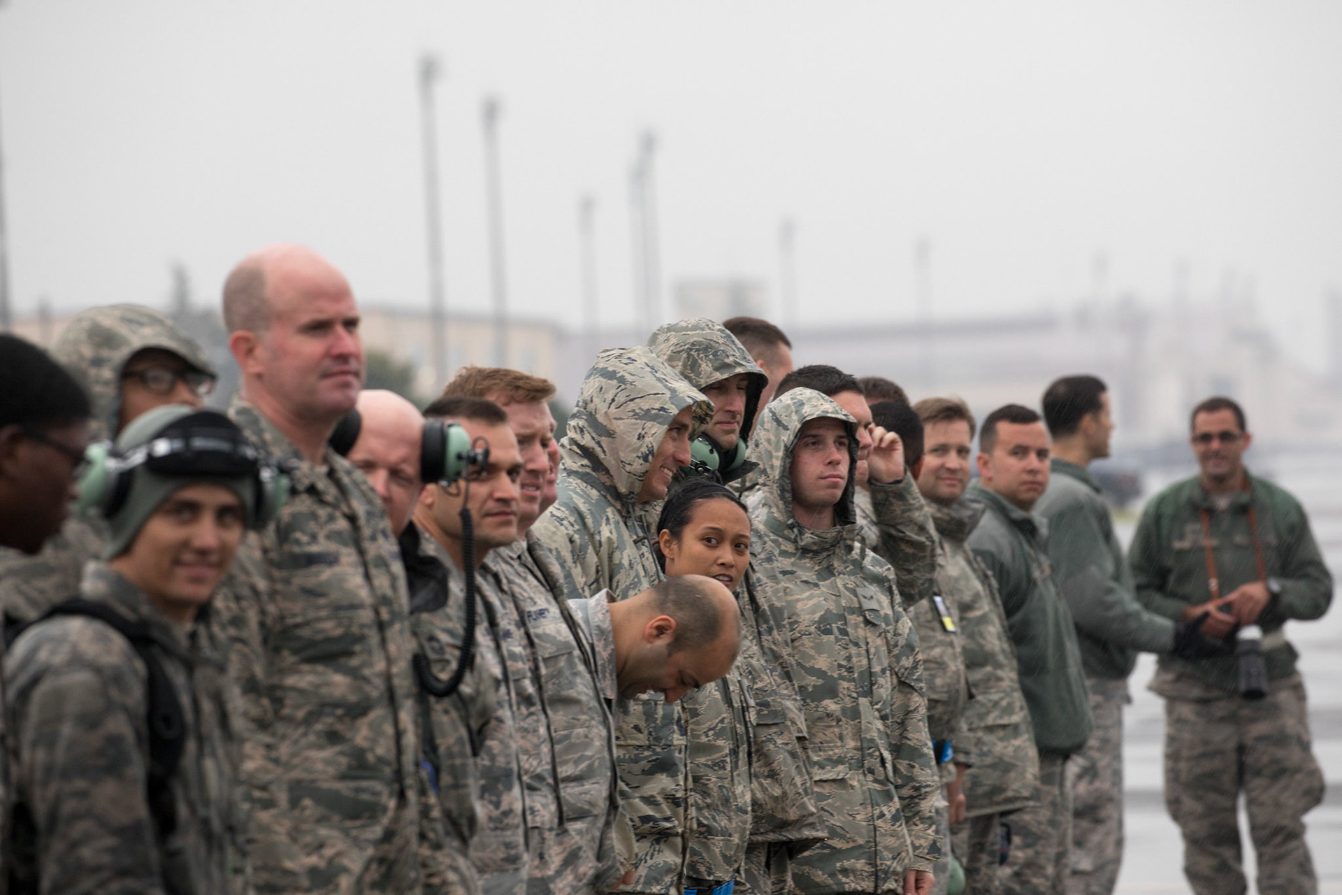 Members with the 374th Aircraft Maintenance Squadron watch the C-130H Hercules taxing on the runway at Yokota Air Base, Japan, Oct. 16, 2017. Yokota was the last active-duty location to operate the C-130H. The 374th AMXS maintained 14 C-130H Hercules aircraft, which were responsible for the tactical airlift of an area of responsibility covering 50 percent of the globe. (U.S. Air Force photo by Yasuo Osakabe)