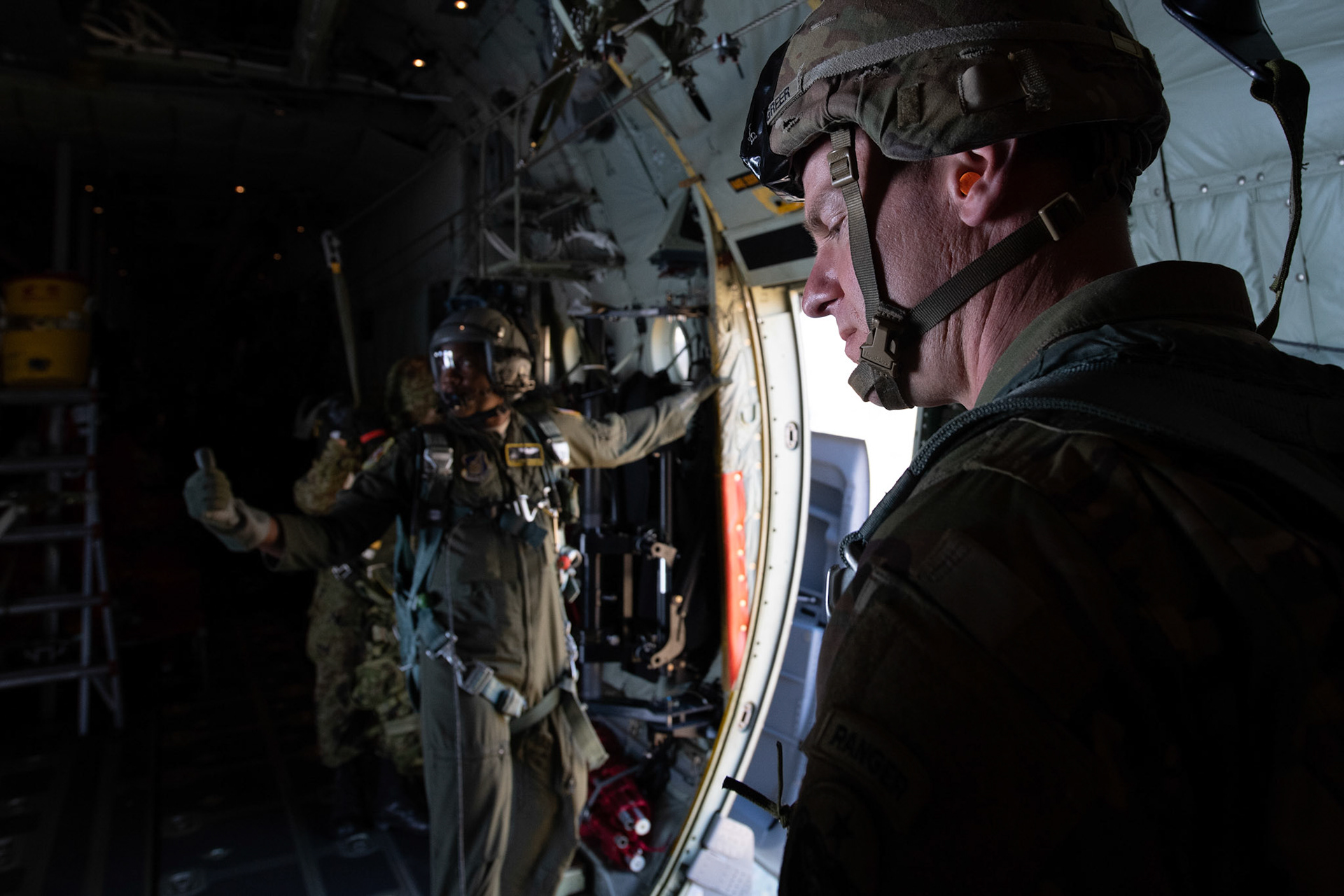 U.S. Army Master Sgt. Nathan Greer, U.S. Army Alaska jump master, takes a breath after supporting Japan Ground Self-Defense Force soldiers jumping from a U.S. Air Force C-130J Super Hercules assigned to the 36th Airlift Squadron over Hiju-dai drop zone, Oita prefecture, Japan, Nov. 4, 2018, during Keen Sword 19. Approximately 280 JGSDF personnel conducted jump training from U.S. Air Force C-130J Super Hercules’ for the first time in Japan. (U.S. Air Force photo by Yasuo Osakabe)