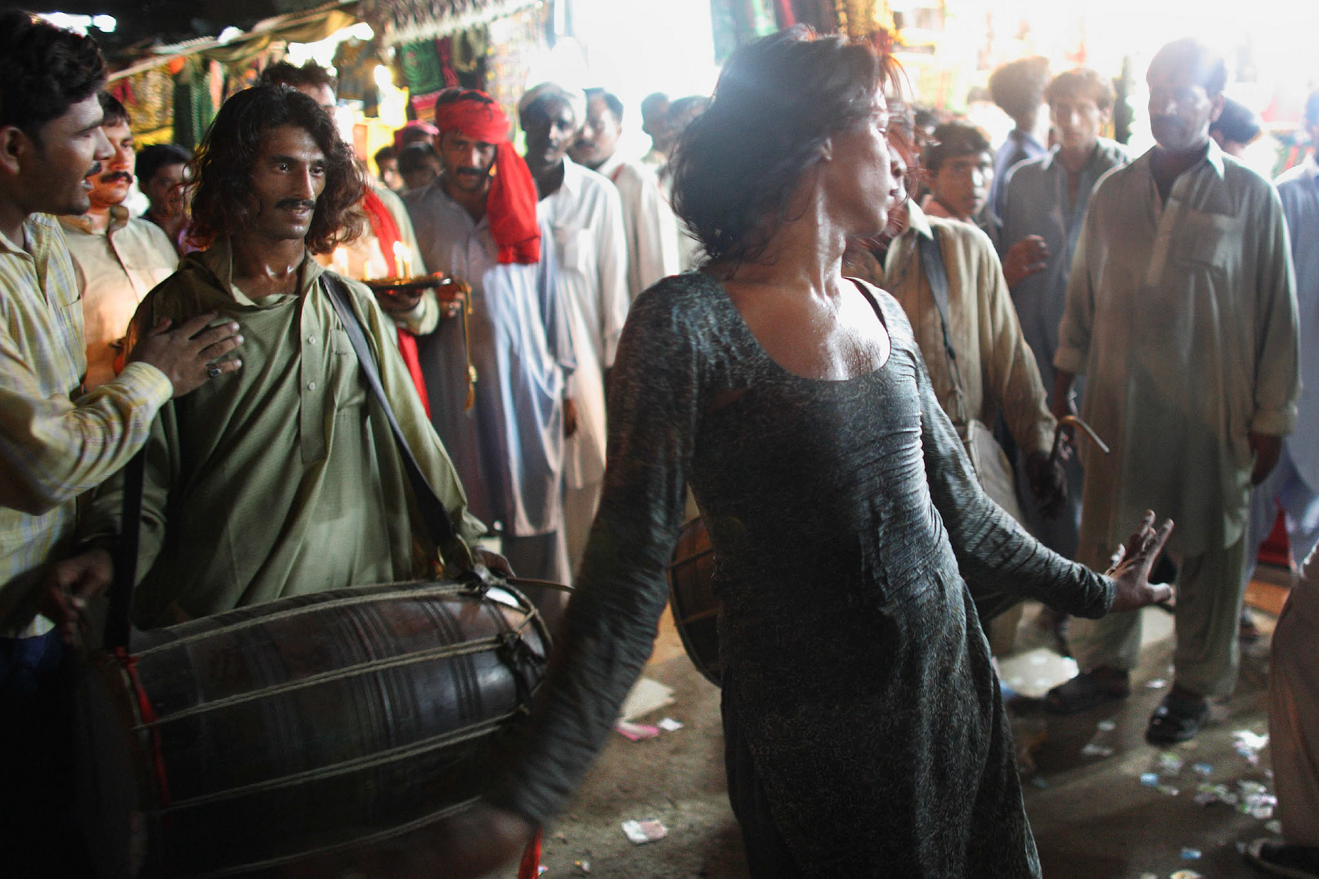Devotee decicated his sprited and powerful Dhamal, which means sufi trance dance, designed to attain union with the Lal Shahbaz Qalandar on the final day of the festival. (Travel).