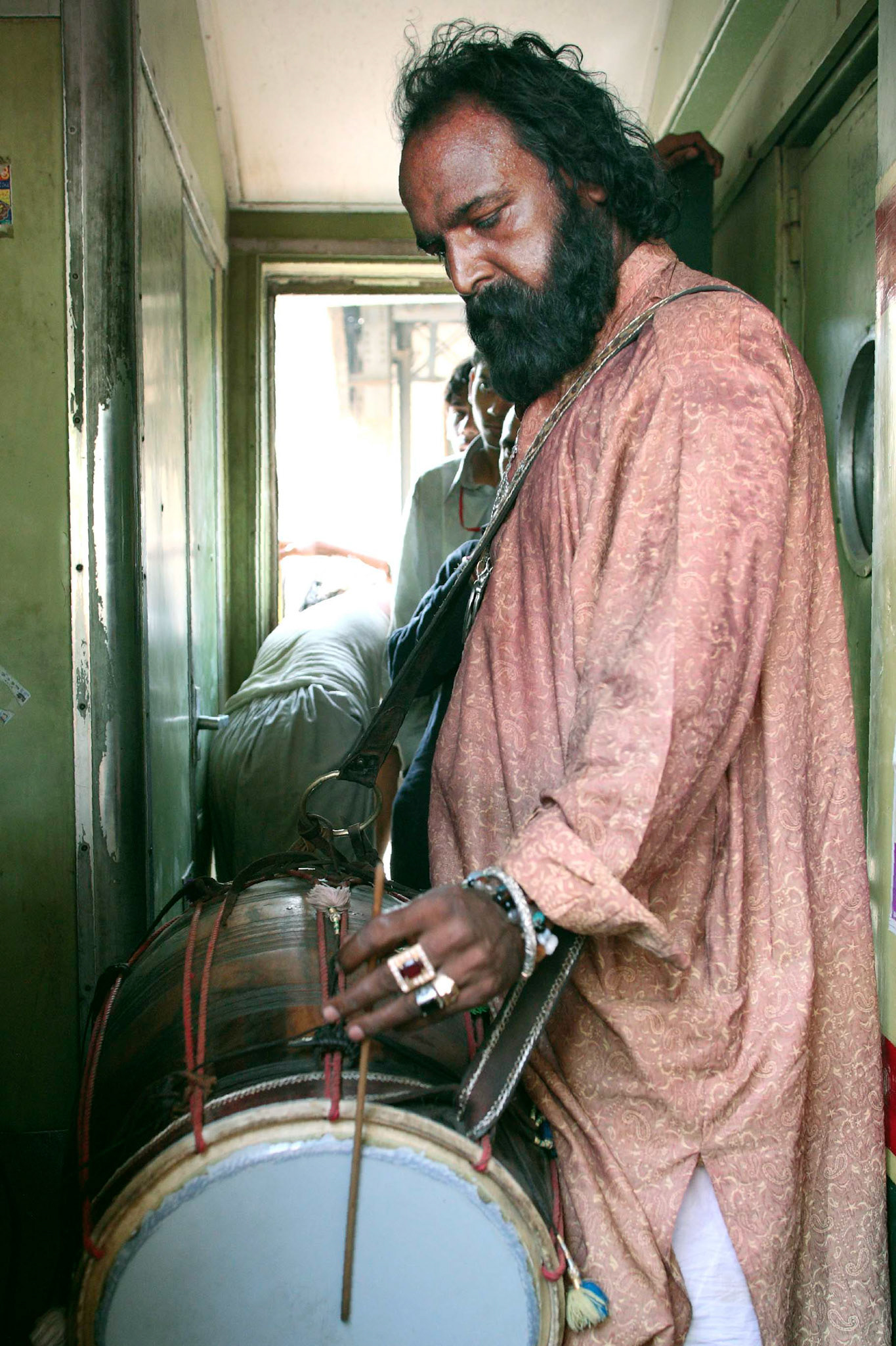 The beat of Pappu sain has a spirited and powerful playing with his partner, Jhura sain. Pappu sain makes the sufi world by the dhol and Jhura sain follows Pappu sain's world. (Travel)