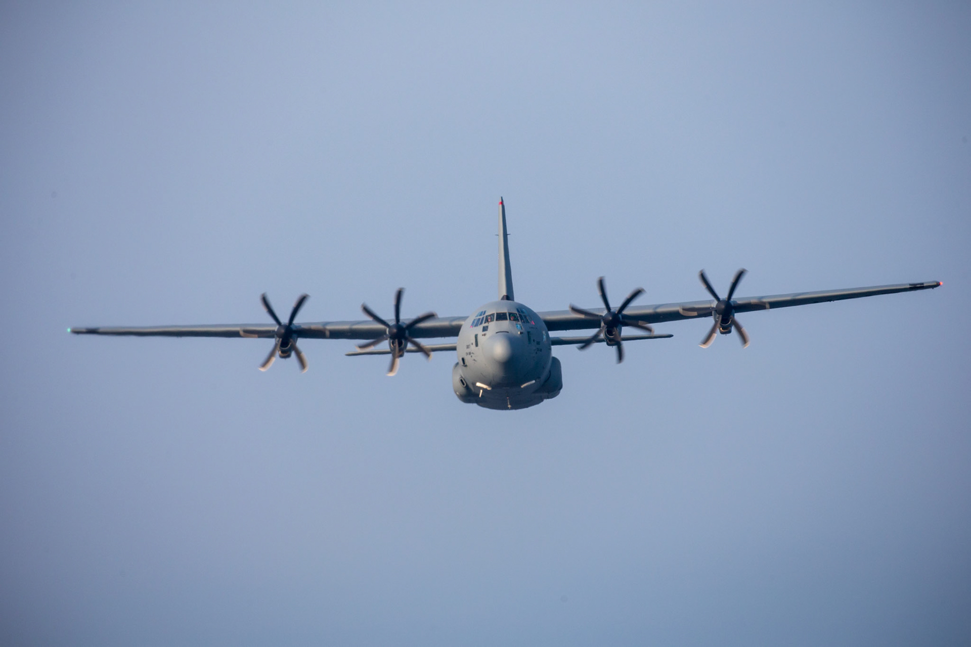 A U.S. Air Force C-130J Super Hercules assigned to the 36th Airlift Squadron flies over the Izu Peninsula, Japan, March 26, 2018. Performing regular in-flight operations gives all related personnel real-world experience to stay prepared for contingency situations and regular operations. (U.S. Air Force photo by Yasuo Osakabe)