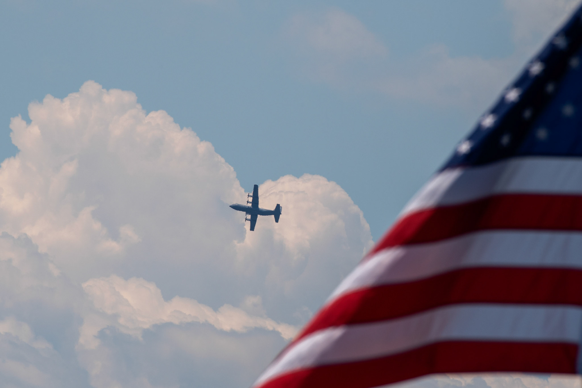 A C-130J Super Hercules assigned to the 36th Airlift Squadron flies over Yokota Air Base, May 29, 2020, during a training mission. All aircraft inbound or outbound Yokota keeps communicating with Air Traffic Controllers for safe flights. (U.S. Air Force photo by Yasuo Osakabe)