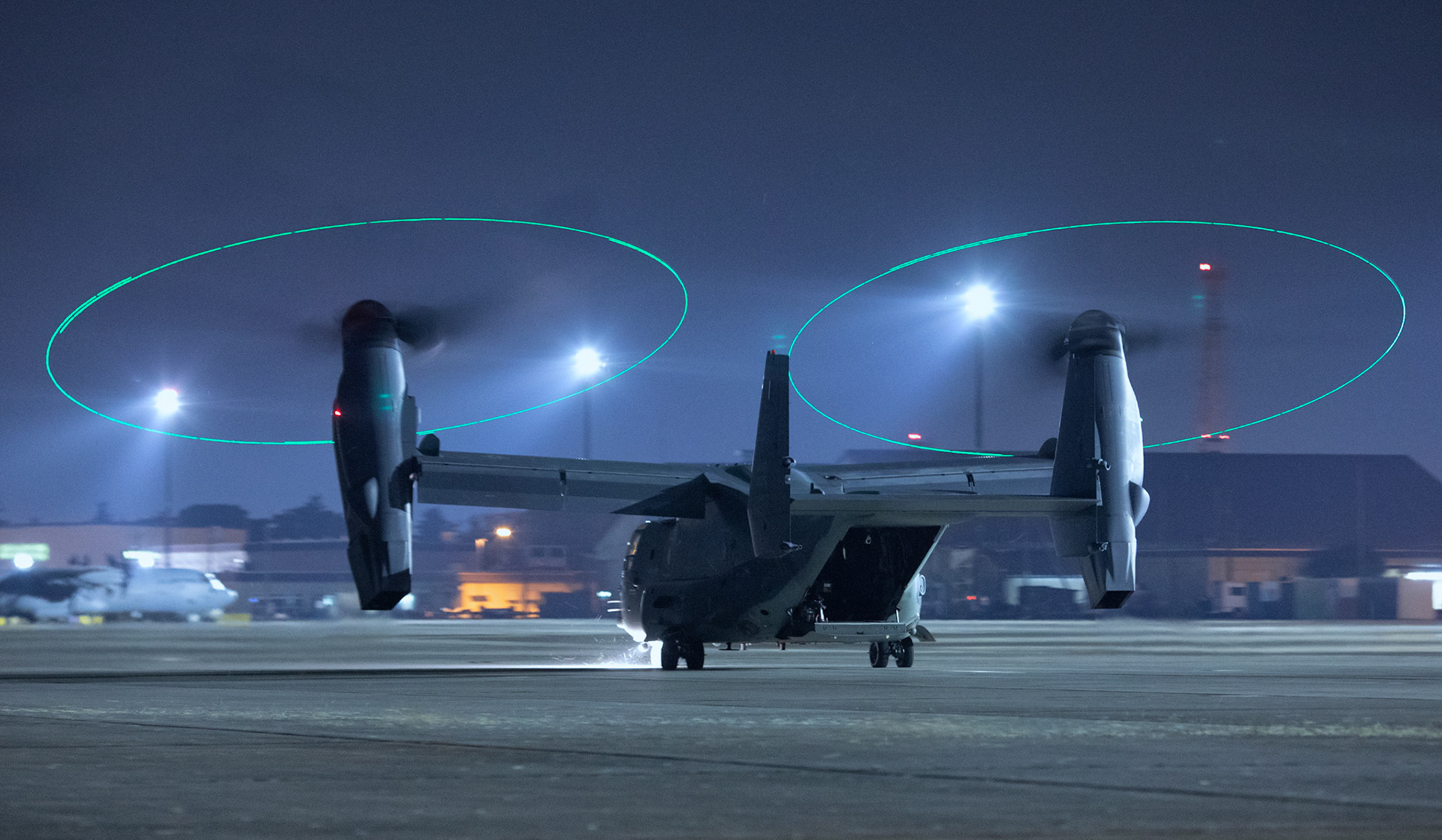 A CV-22 Osprey assigned to the 21st Special Operations Squadron taxis down the flightline during Exercise Gryphon Jet at Yokota Air Base, Japan, June 23, 2020. The Exercise Gryphon Jet is an integrated training exercise focused on improving interoperability throughout the special operations community. (U.S. Air Force photo by Yasuo Osakabe)