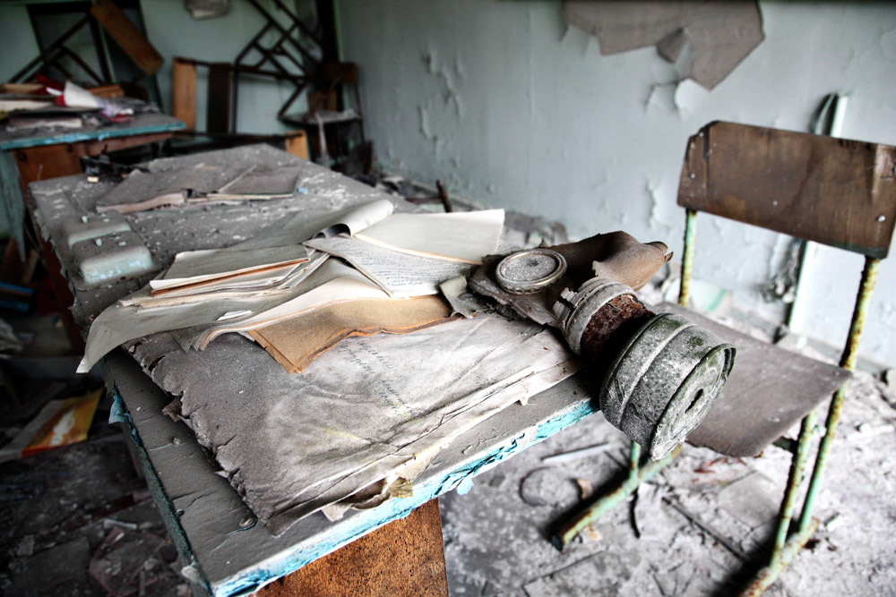Debris spread on the desk tells that the hasty evacuation of Pripyat initiated after the Chernobyl disaster.