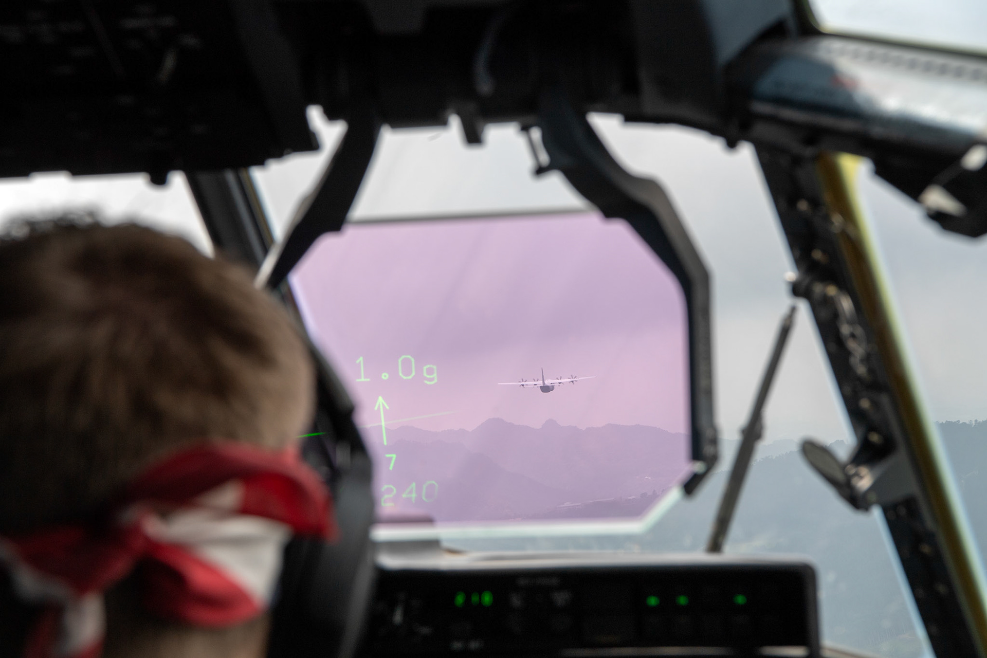 A U.S. Air Force C-130J Super Hercules assigned to the 36th Airlift Squadron conducts flight training over Mount Aso, Japan, July 16, 2019, during a bilateral jump training. The training allows USAF and JGSDF units to work alongside each other while improving the readiness of our armed forces. (U.S. Air Force photo by Yasuo Osakabe)