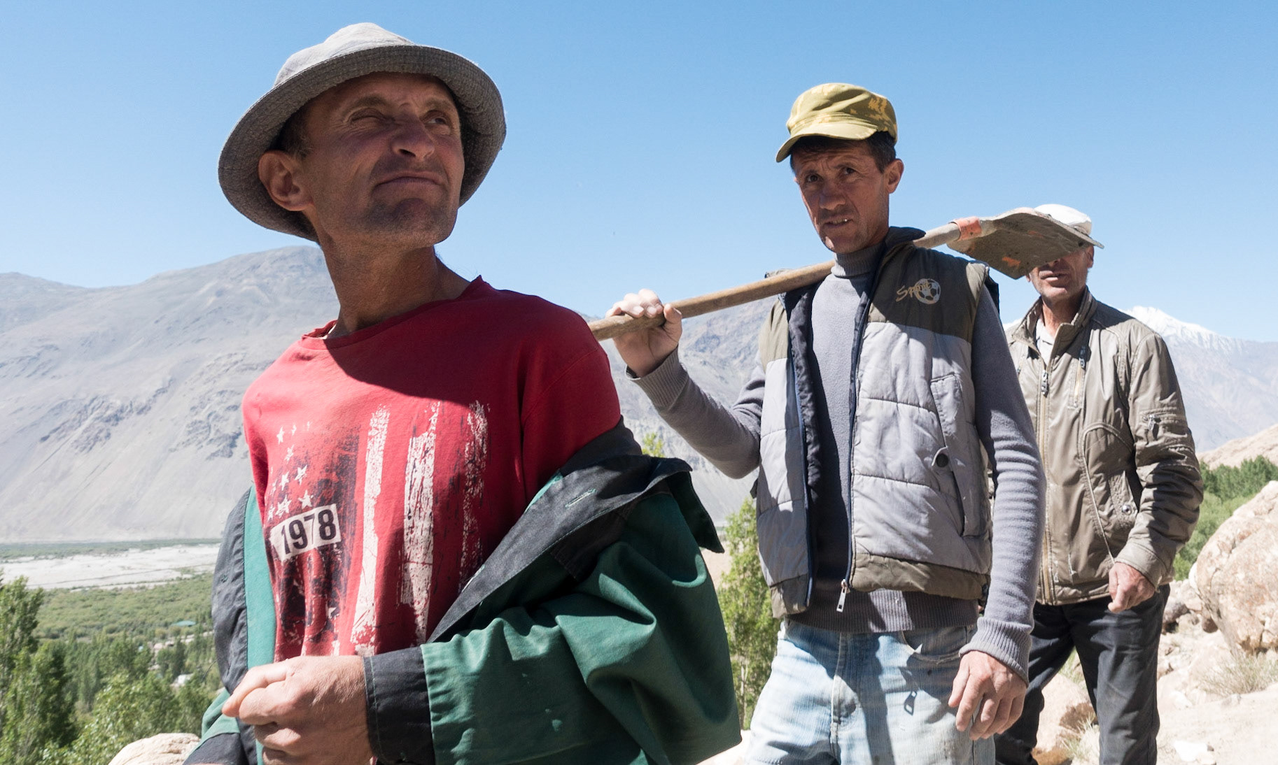 Vrang: Walk to Petroglyphs -  Locals returning from tending Graves